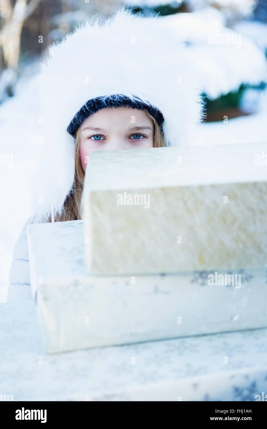 Cute girl with warm clothes Stock Photo