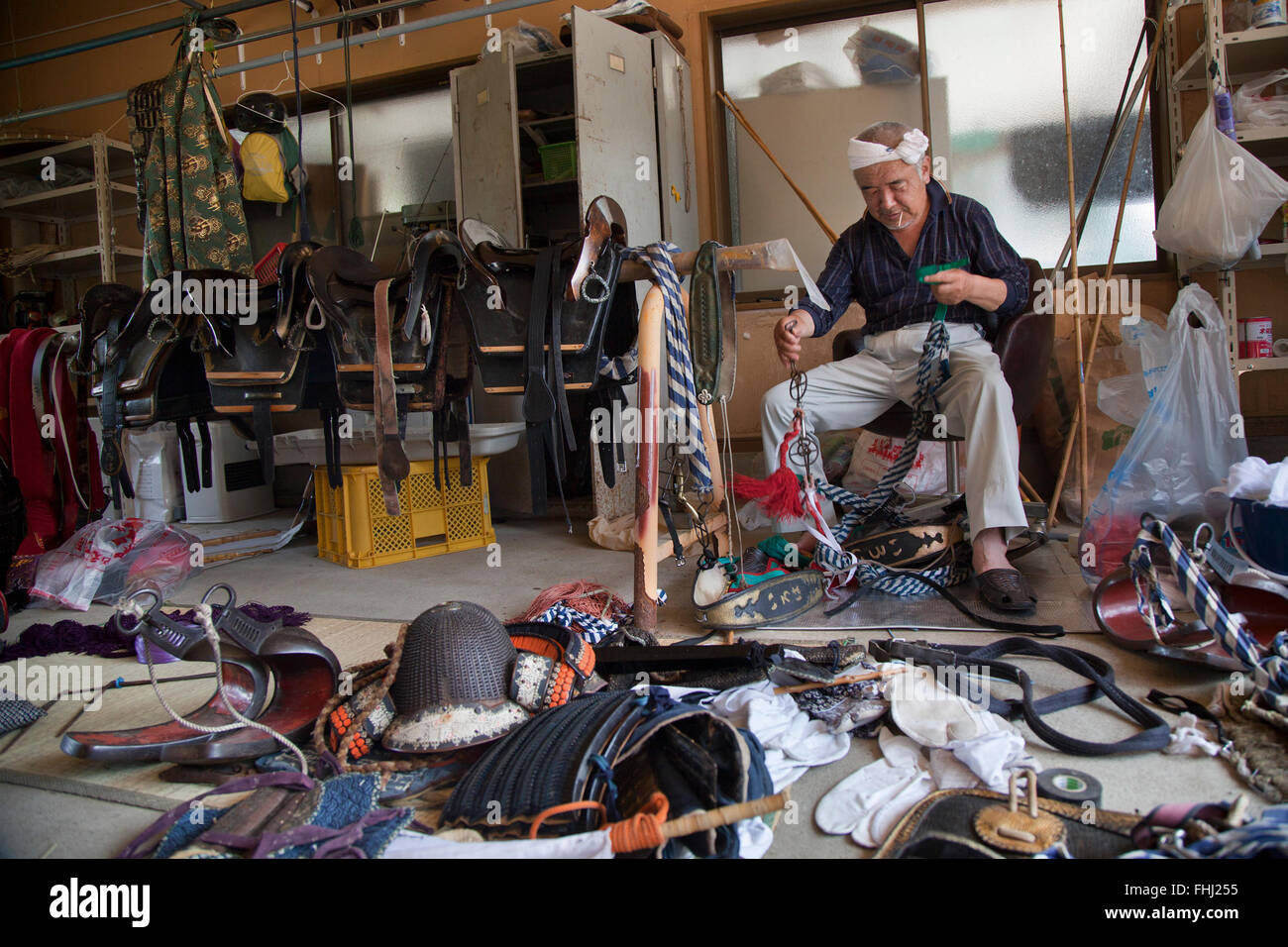 Japan / Fukushima  -   Once all the events are finished, they gather on the following day to put away the equipment and wash the Stock Photo