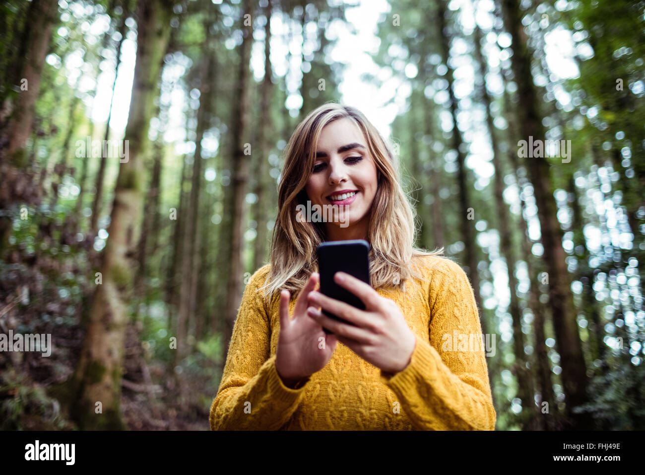 Serious blonde woman holding hi-res stock photography and images - Alamy