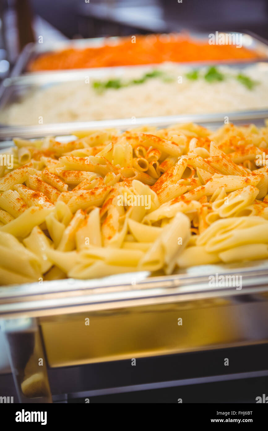Serving dishes of potato and pasta Stock Photo Alamy