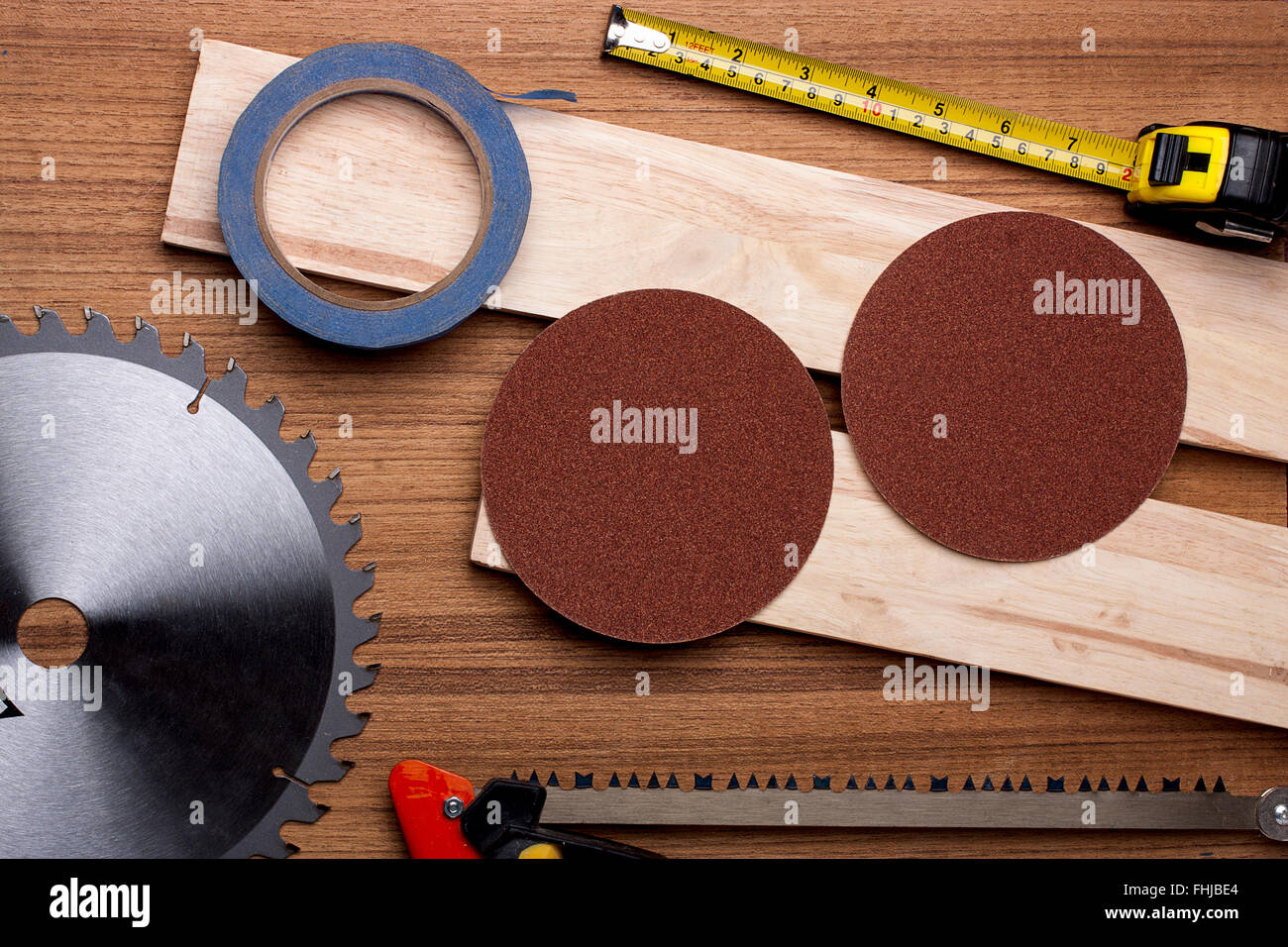 Elements of the circular on woodwork. Stock Photo