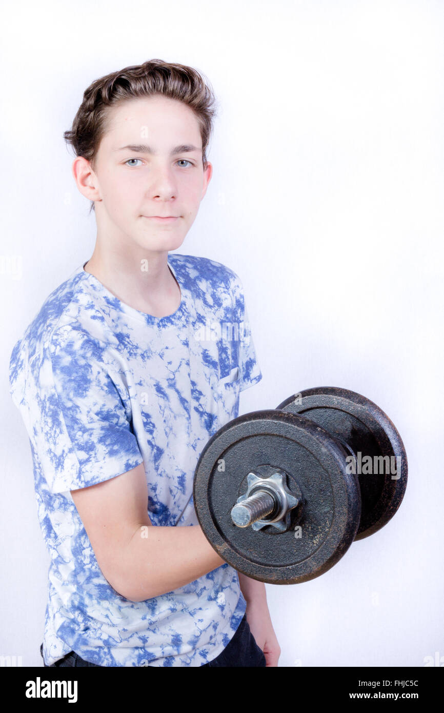 teenage-boy-lifting-weights-stock-photo-alamy