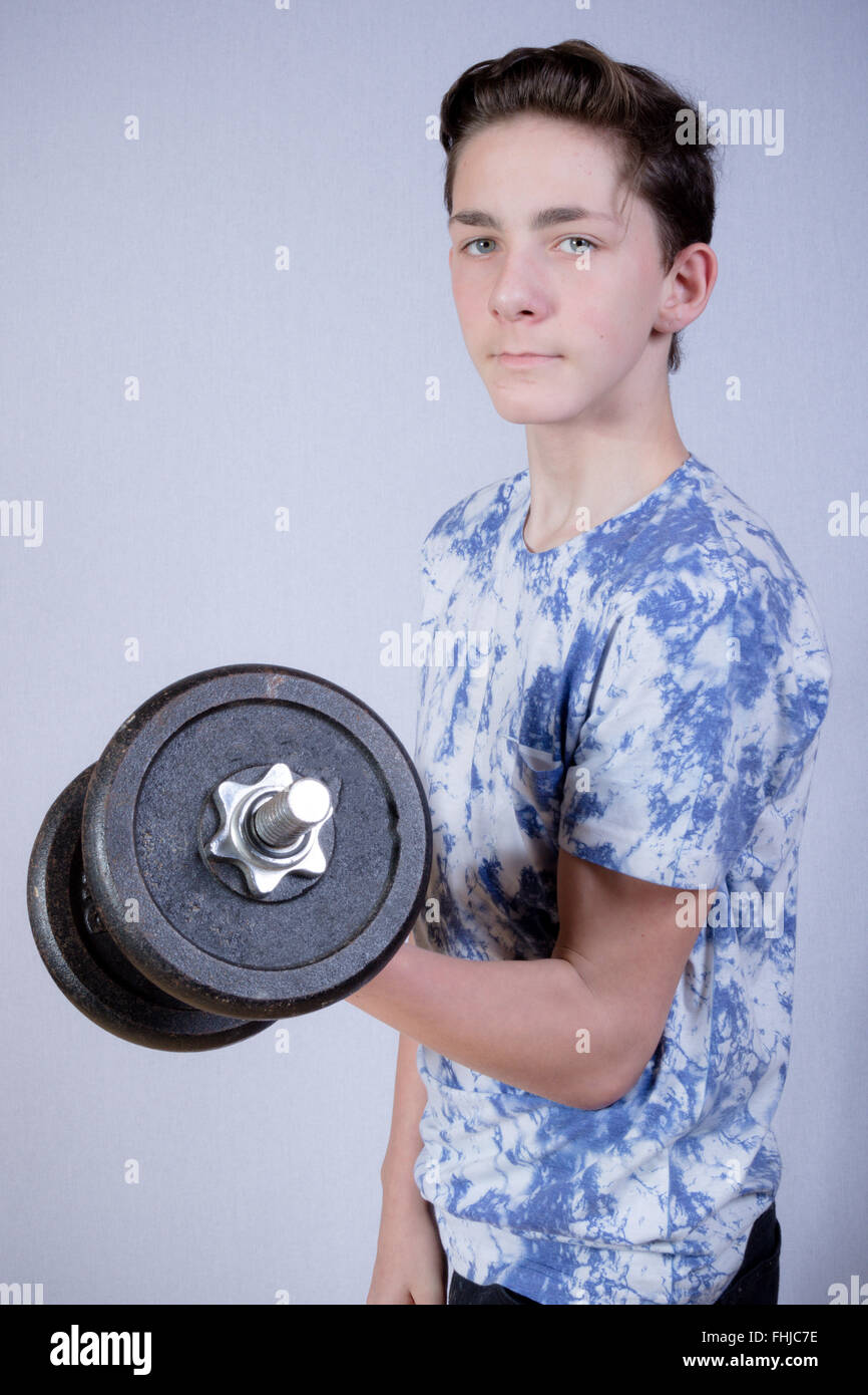 Teen boy weight lifting hires stock photography and images Alamy