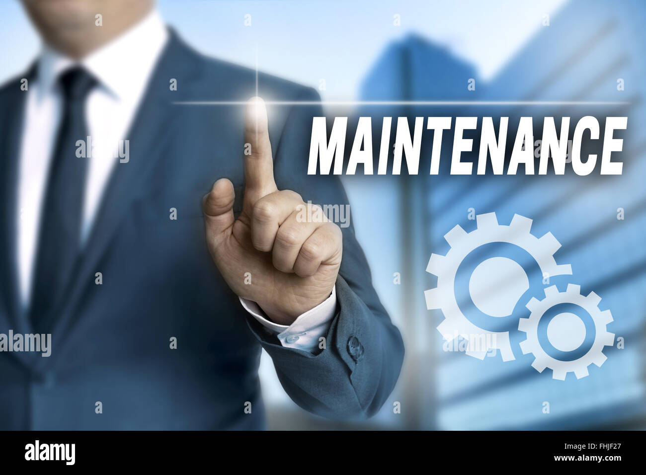 maintenance touchscreen is operated by businessman. Stock Photo