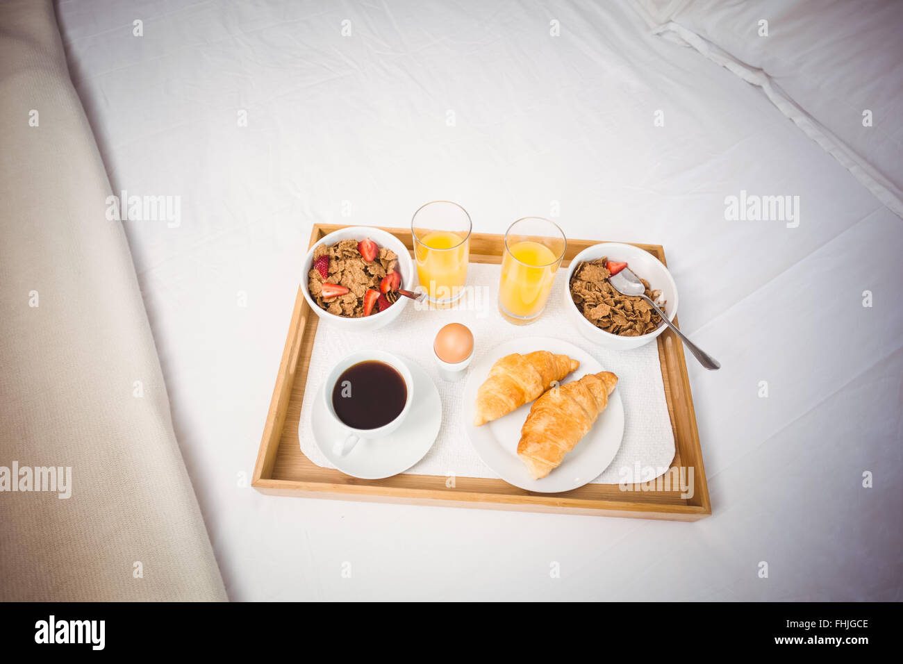 Tray of breakfast on bed Stock Photo Alamy