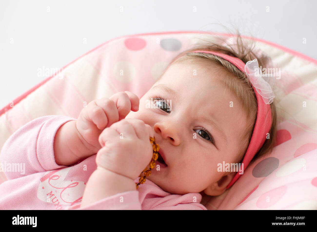 teething baby Stock Photo