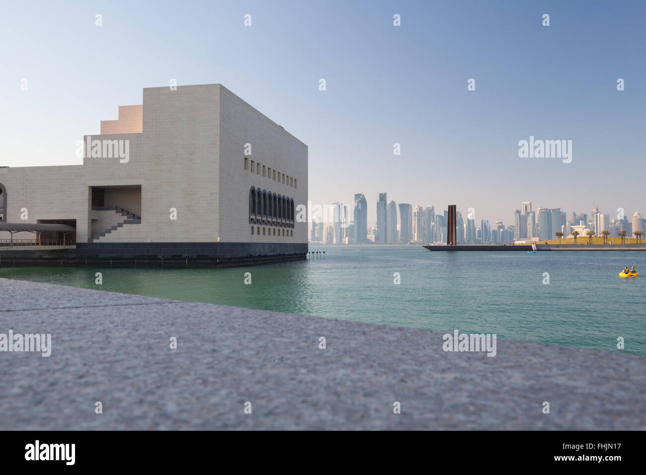 Museum of Islamic Art, Doha, Qatar. View from the walkway around the park towards Serra Seven and West Bay. Stock Photo