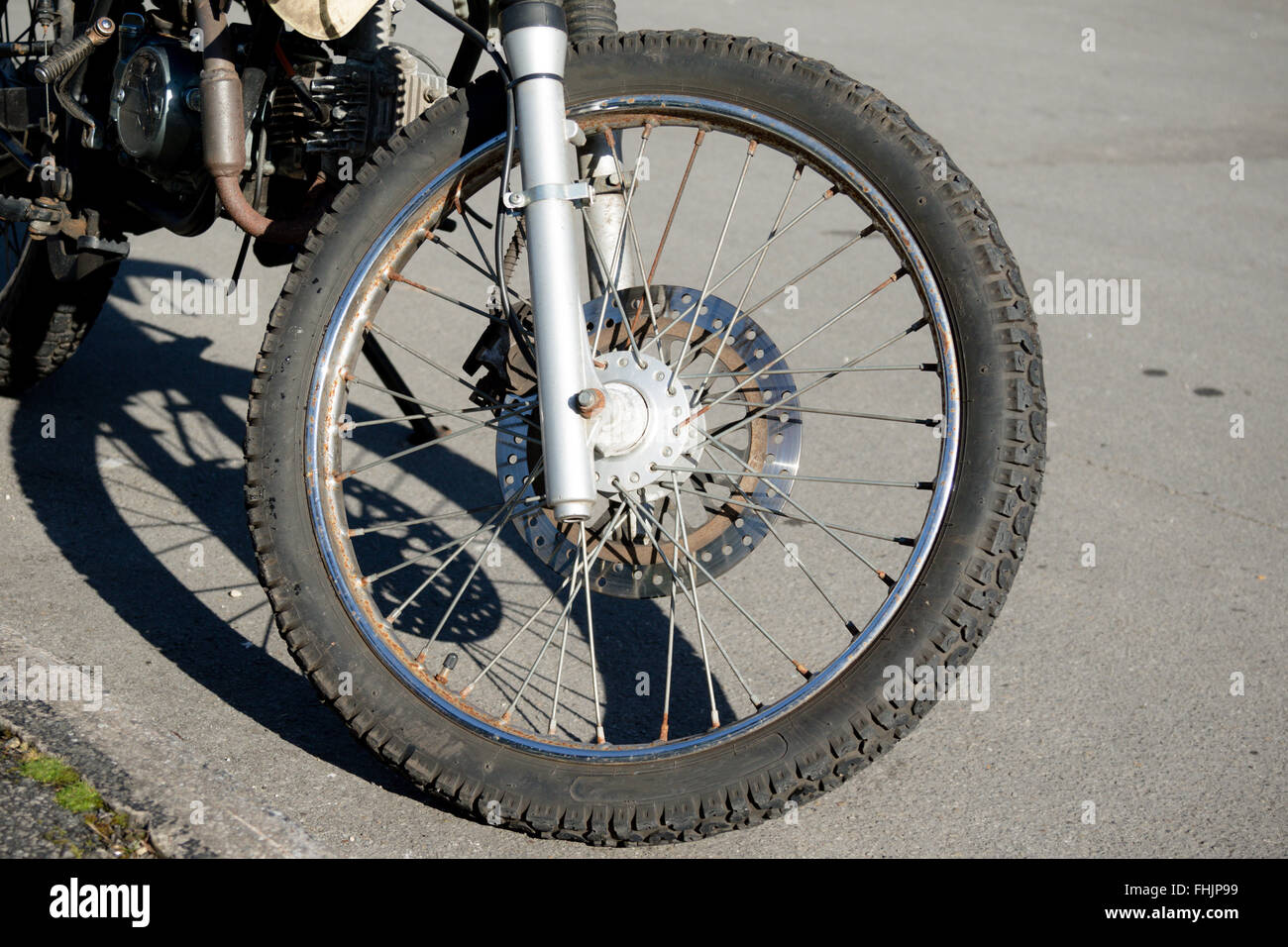 Motorbike front wheel Stock Photo Alamy