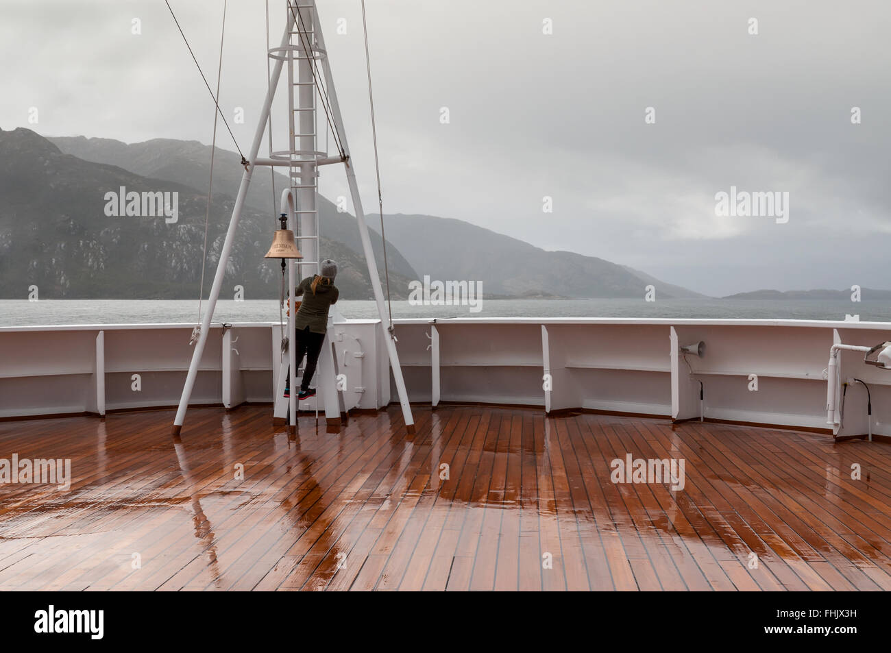 Passenger on board the cruise ship Veendam looking forward on the bow on Beagle Channel Stock Photo