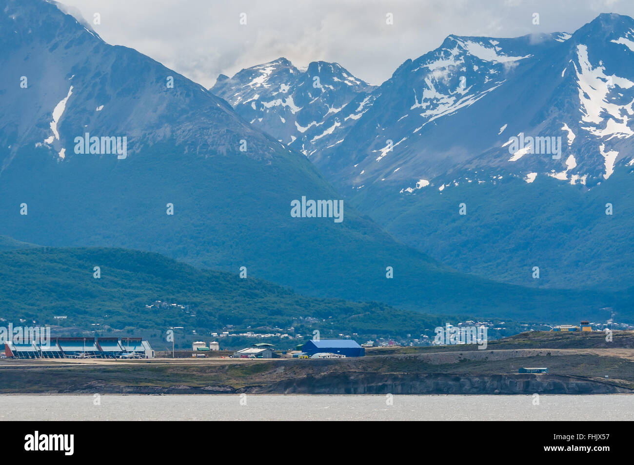 Panoramic views of the Ushuaia Malvinas Argentinas International Airport in the foreground. Stock Photo