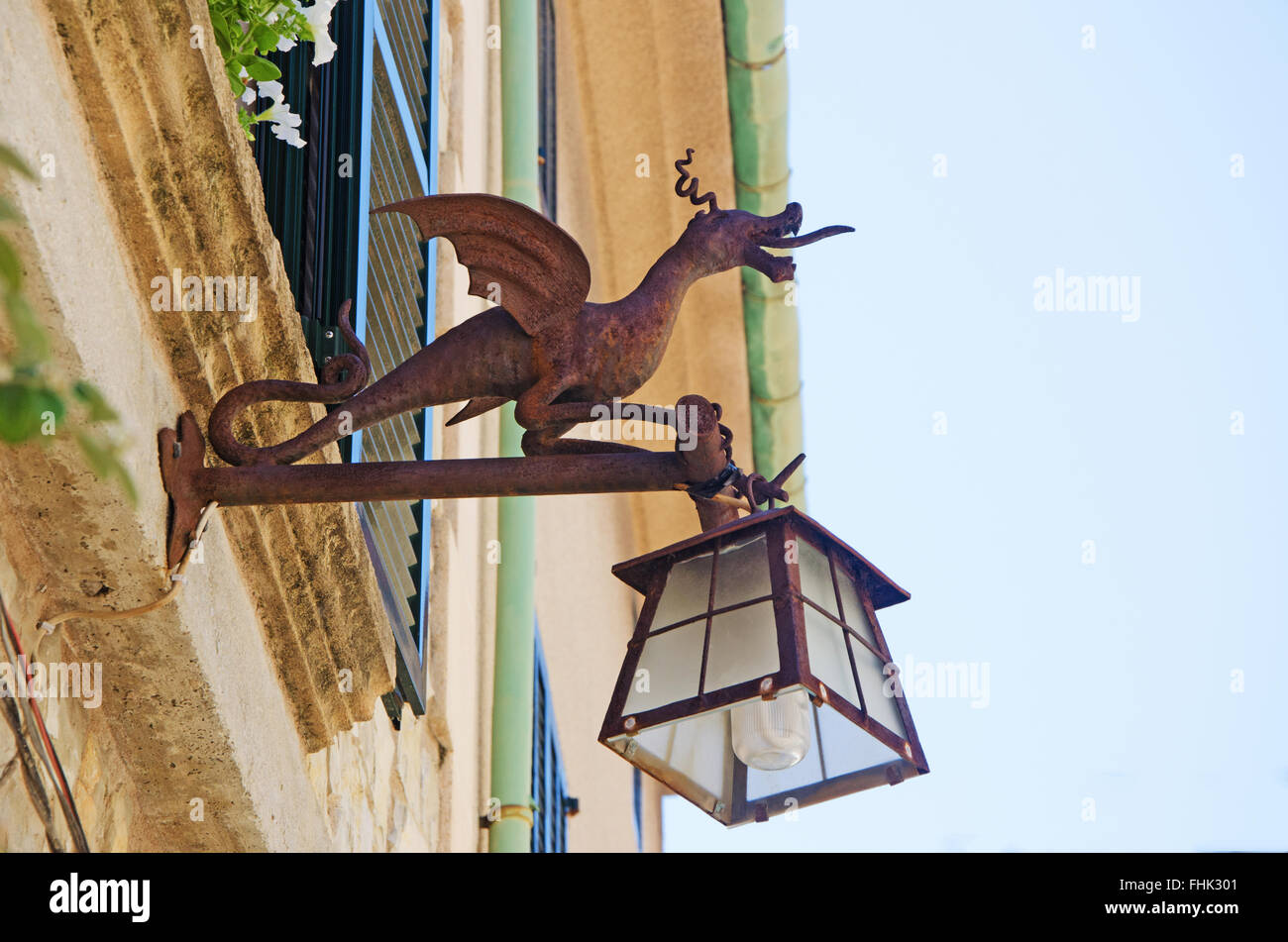 Mallorca, Balearic Islands, Spain, Europe: urban decorations and street furniture, an iron lamp post in the shape of a dragon Stock Photo
