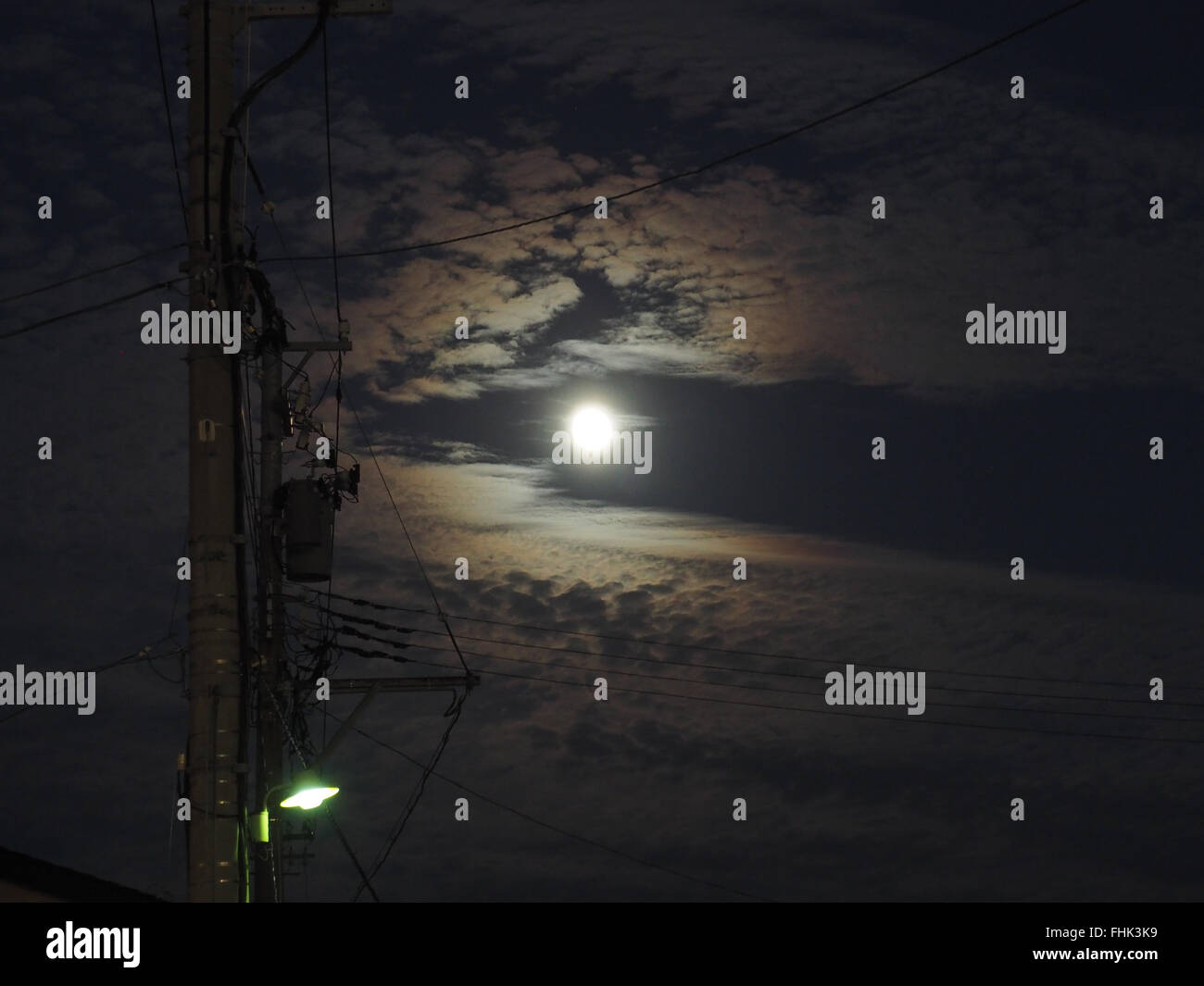 Moonlight sky with lamppost in Japan Stock Photo
