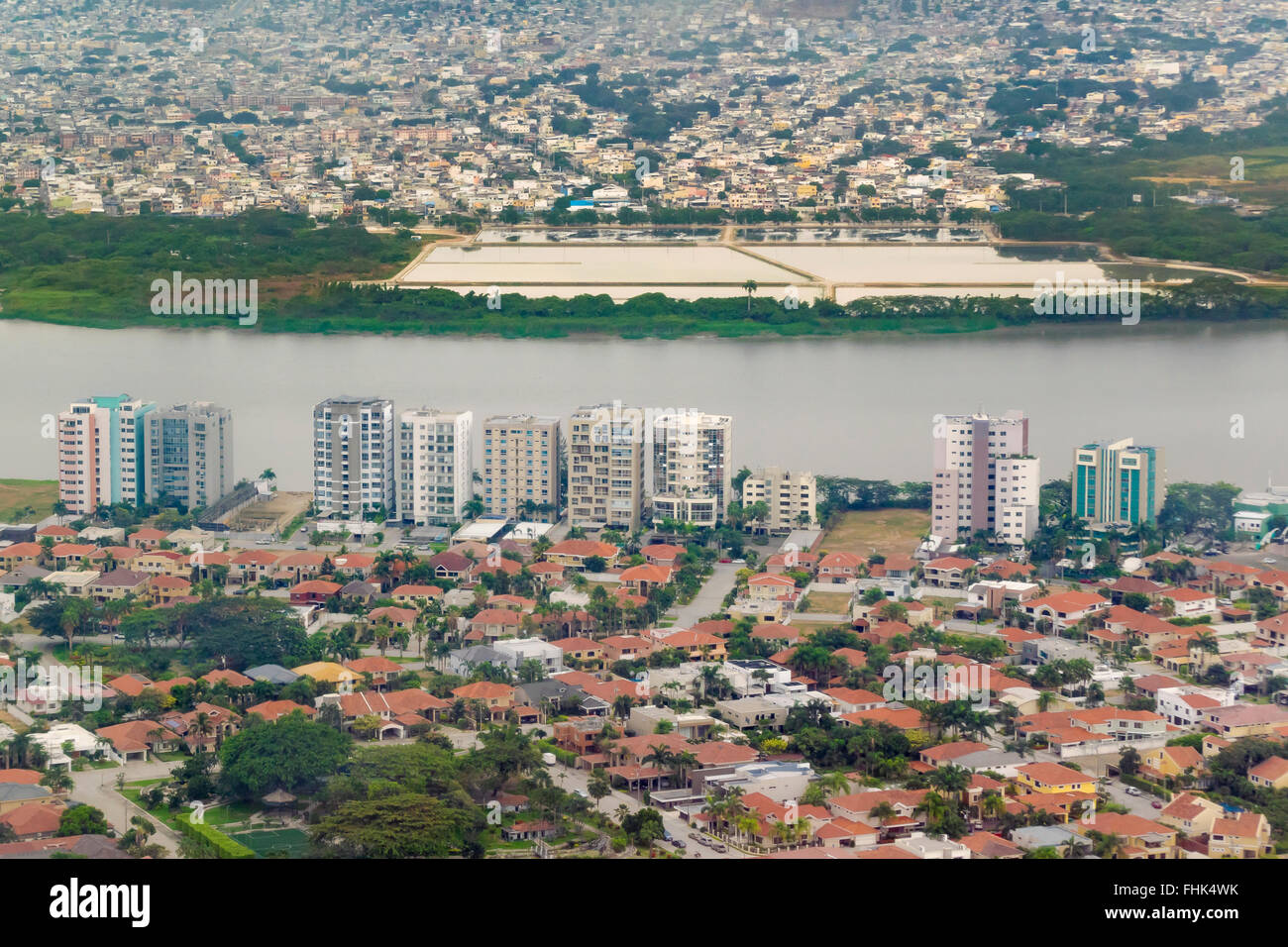 Aerial view of the capital of Ecuador, Guayaquil  from window  plane arriving to the airport. Stock Photo
