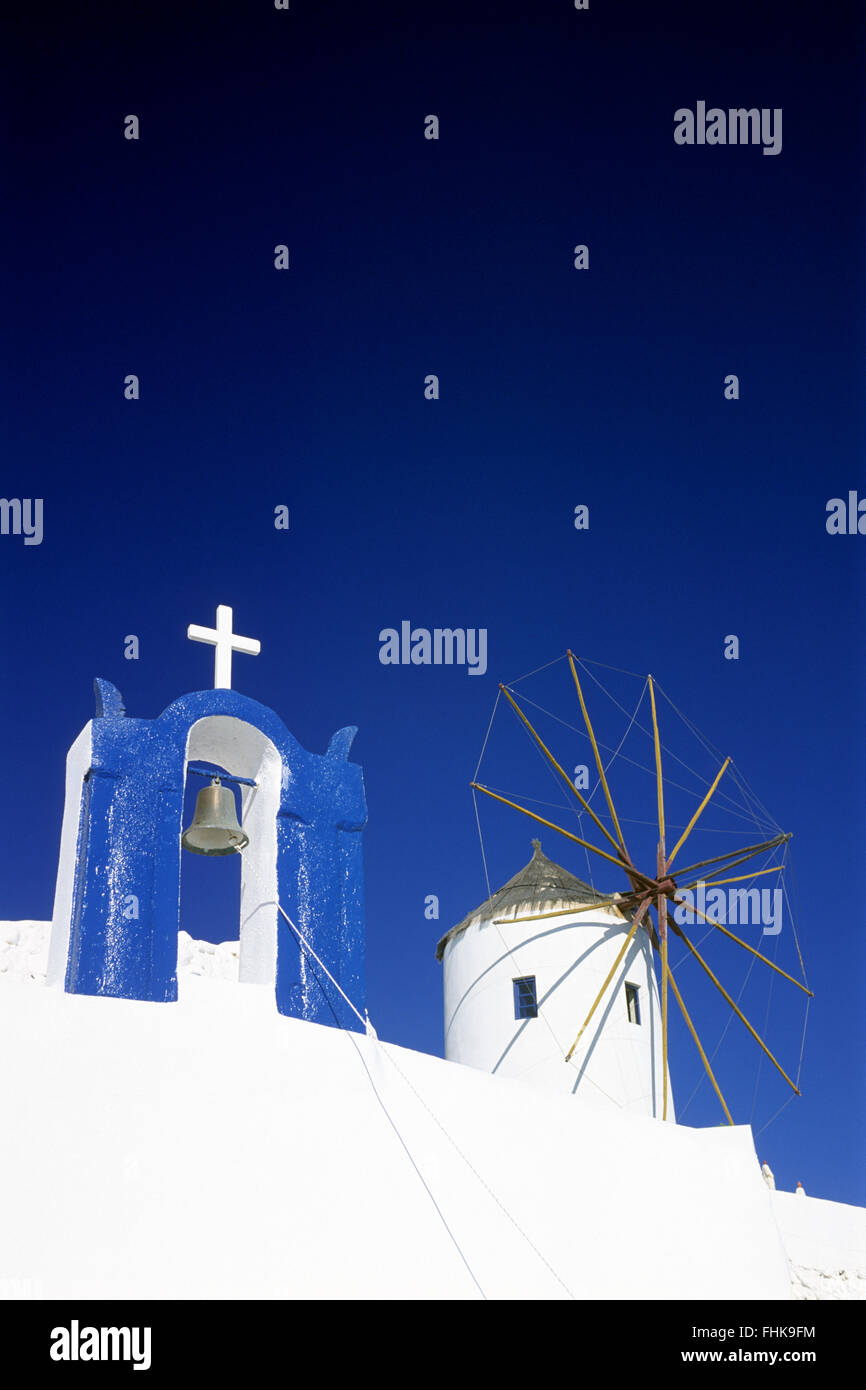 Church and windmill, Oia, Santorini, Cyclades Islands, Greece Stock Photo