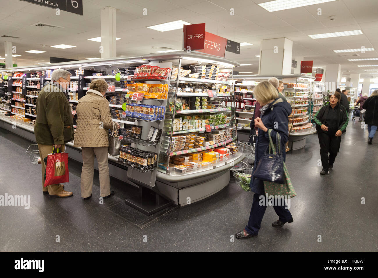 M&S Food; People shopping for food in a Marks and Spencer ( M&S ) foodhall store, Cambridge UK Stock Photo