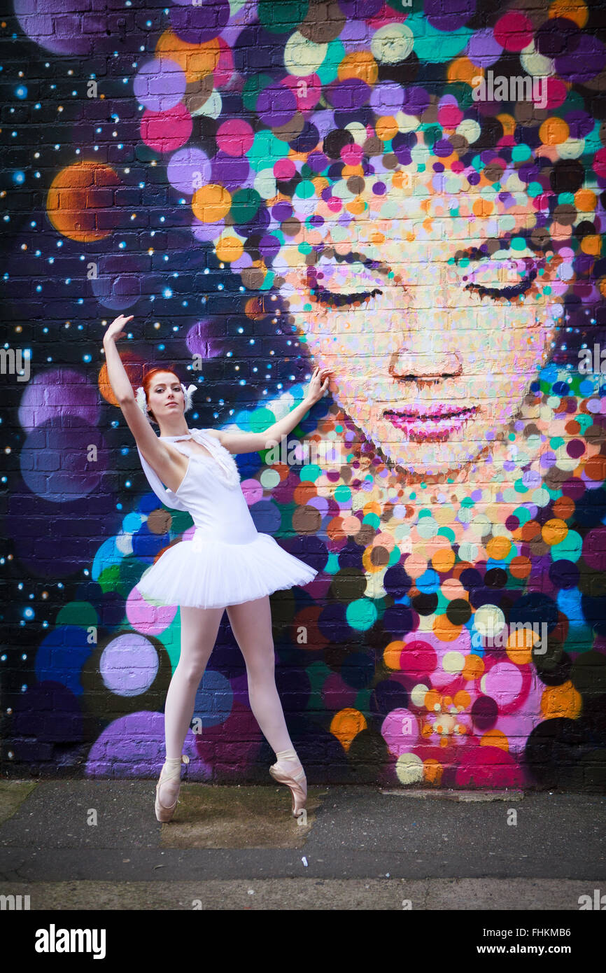 Ballerina in an urban environment. Graffiti by Jimmy C.  Gibb Street, Custard Factory, Digbeth, Birmingham, UK Stock Photo