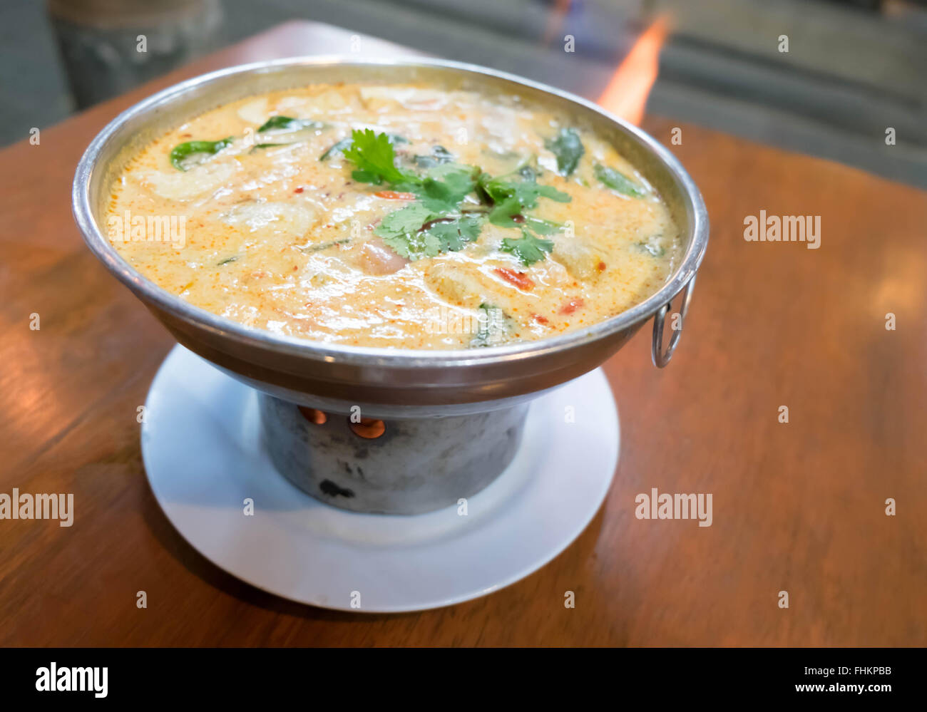 Tom yum goong (shrimp hot pot) with coconut soup, a Thai famous menu Stock Photo