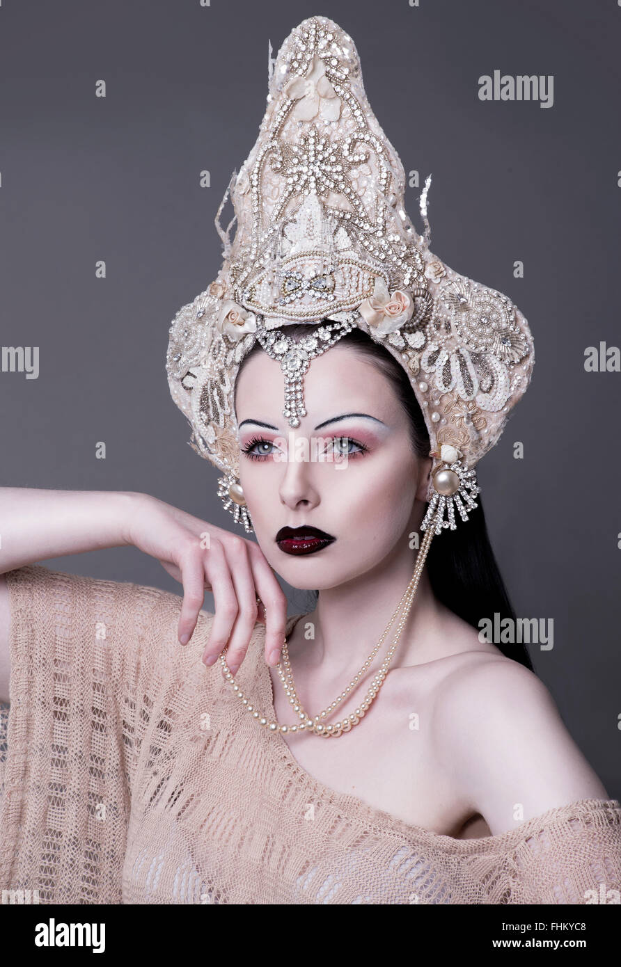 Beautiful fashion model Liv Free with her Game of Thrones style headpiece, amazing makeup and pale white skin Stock Photo