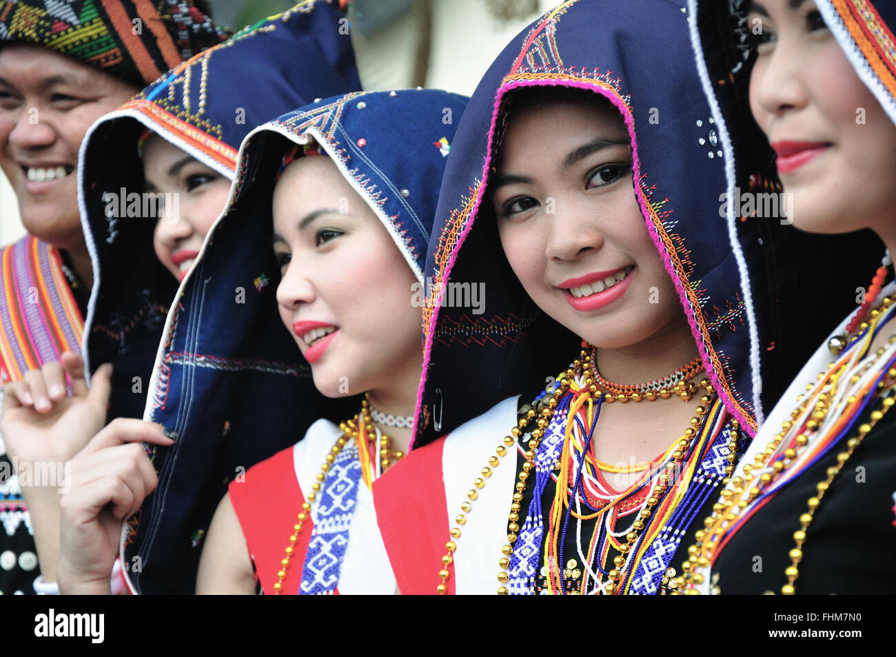 Women of Kadazandusun ethnic in traditional costumes during the State Harvest Festival Celebration in KDCA, Kota Kinabalu, Sabah Stock Photo