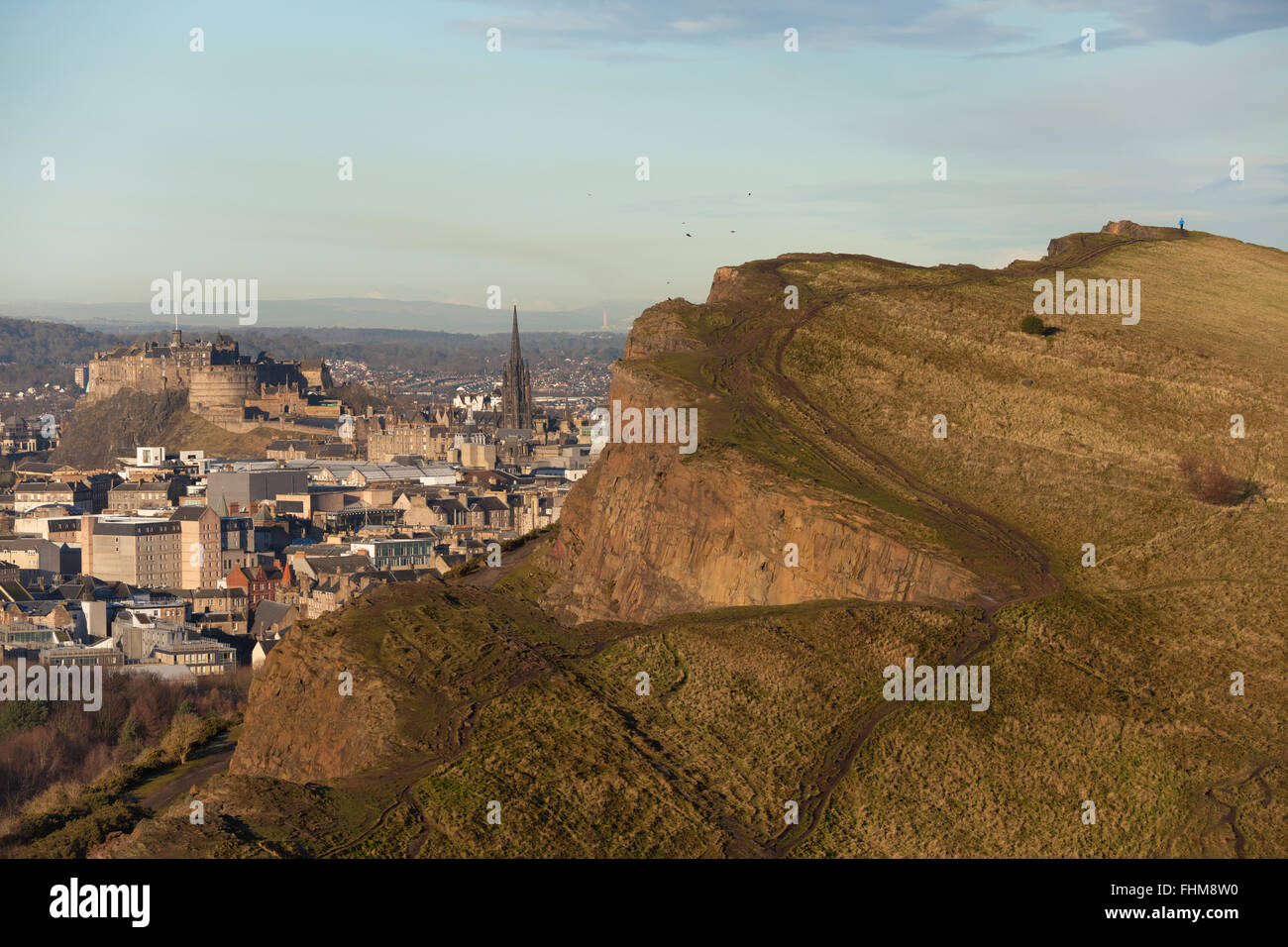 View of Edinburgh Castle and Salisbury Crags from Holyrood Park, Edinburgh, Scotland. Stock Photo