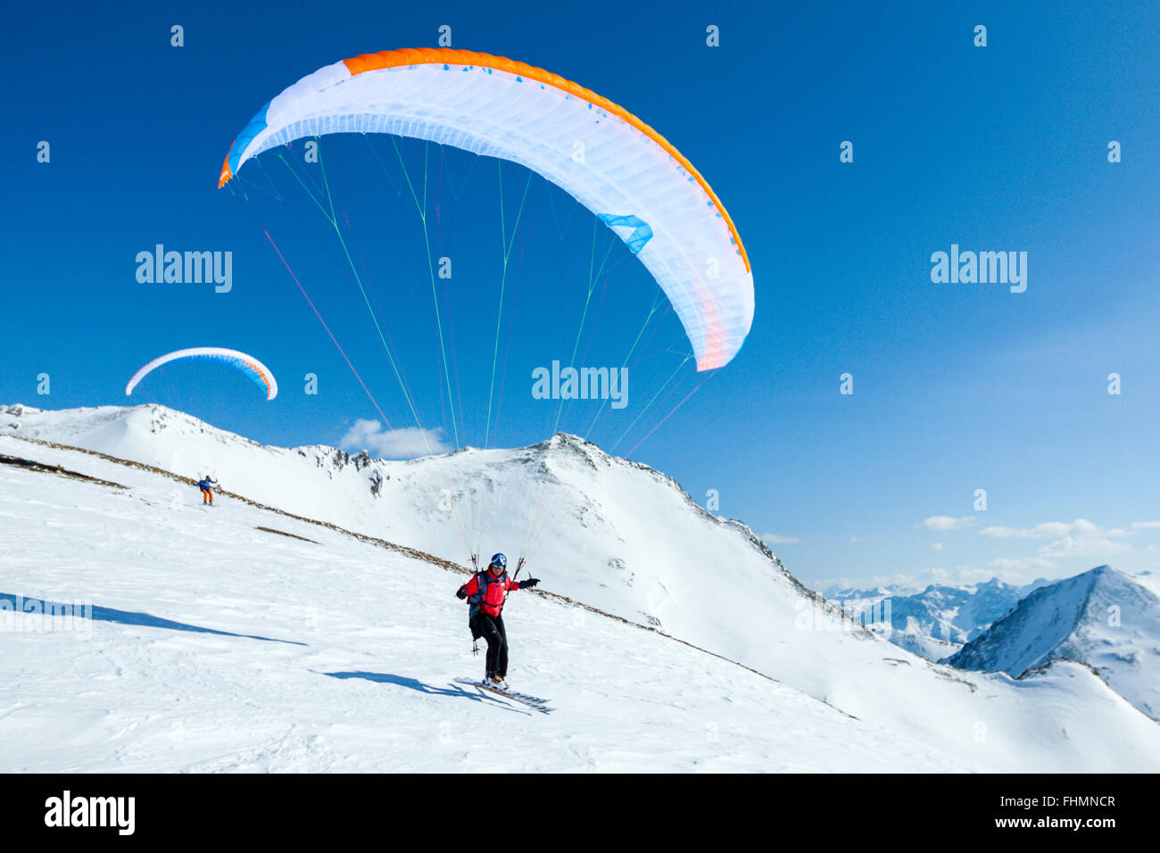 Paragliding Take off with Ski, Silvretta Skiing Area, Ischgl, Tyrol, Austria Stock Photo