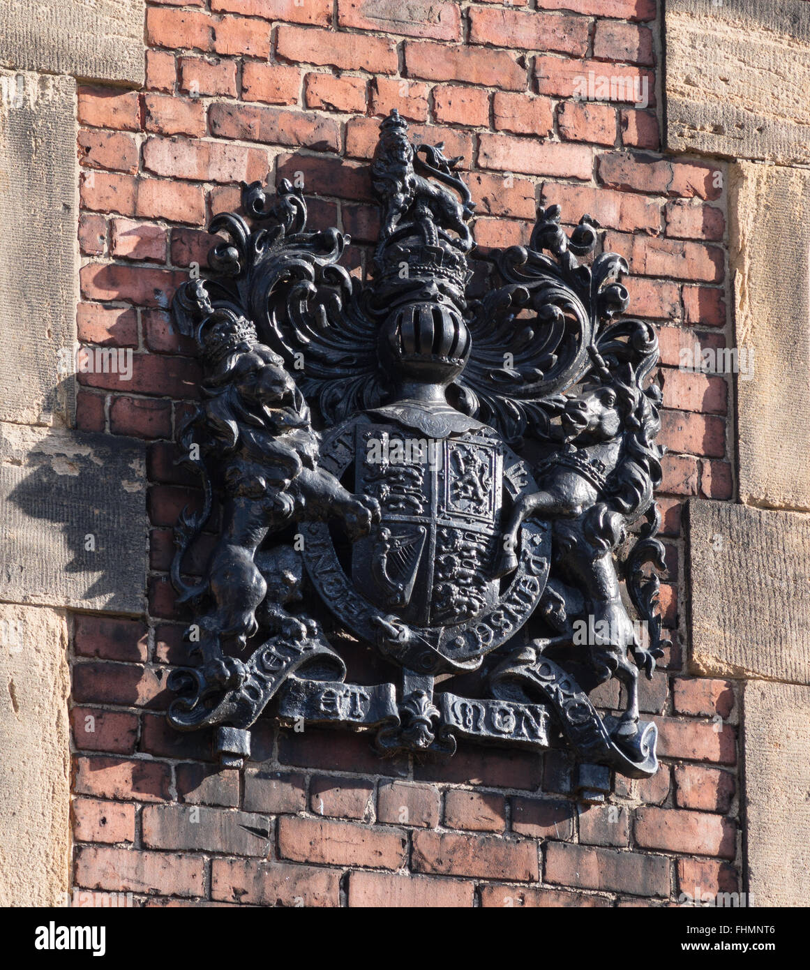 Victorian Royal Coat of Arms on the wall of the Norfolk Hotel, Sunderland, North East England, UK Stock Photo