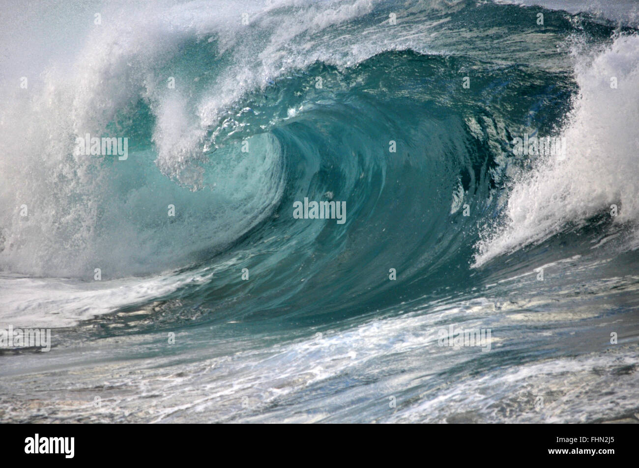 Giant waves break in Waimea Bay Beach, North Shore, Oahu, Hawaii, USA Stock Photo