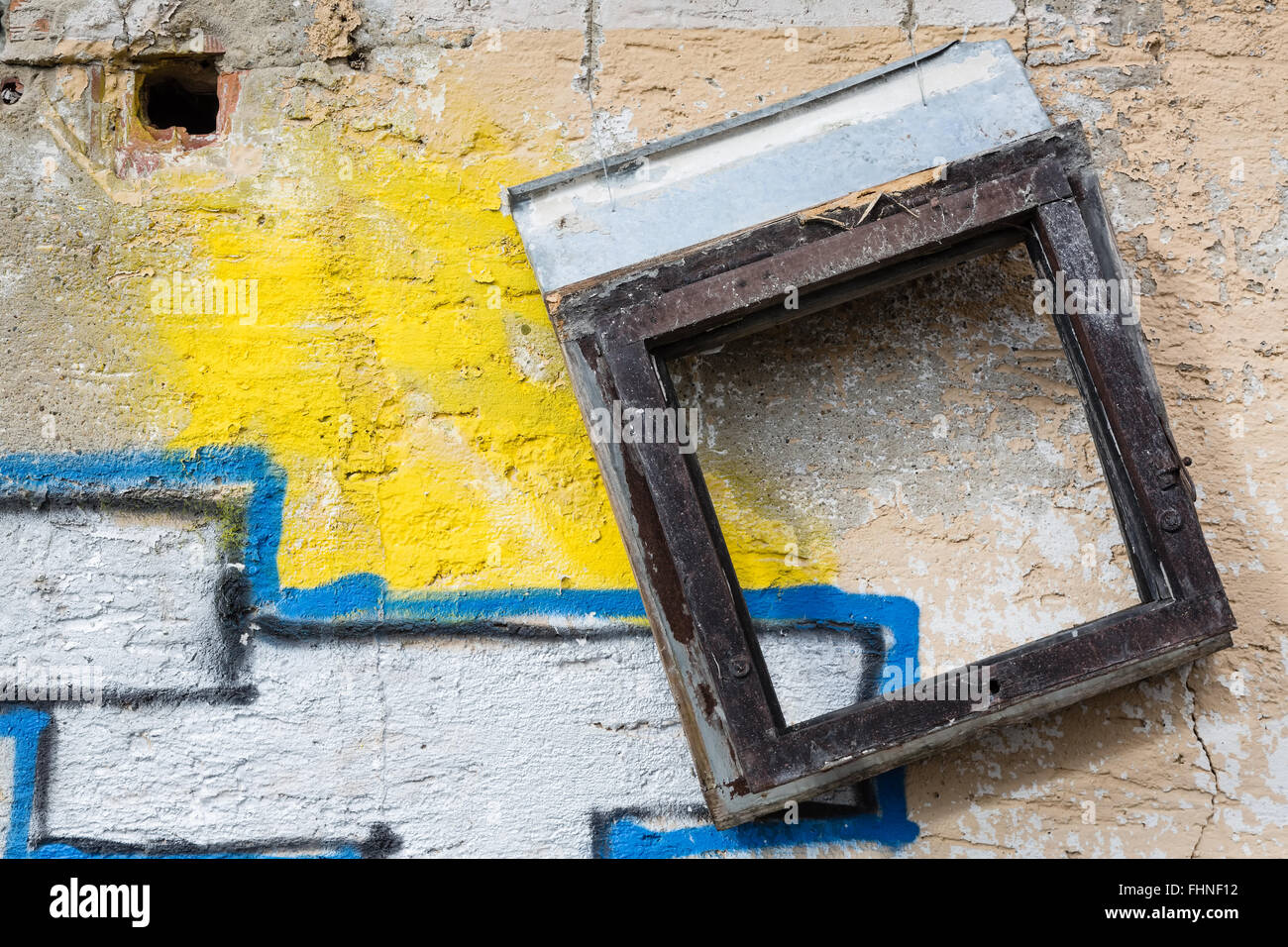 Wall of demolished old building and graffiti Stock Photo
