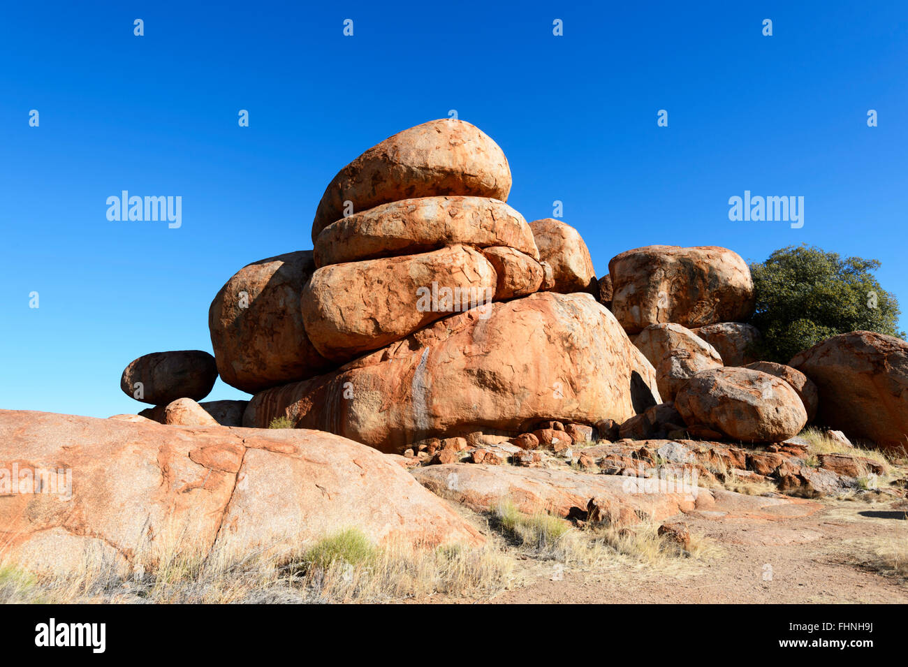 Red eroded granite boulders at Devil's Marbles, a popular tourist destination, Northern Territory, NT, Australia Stock Photo