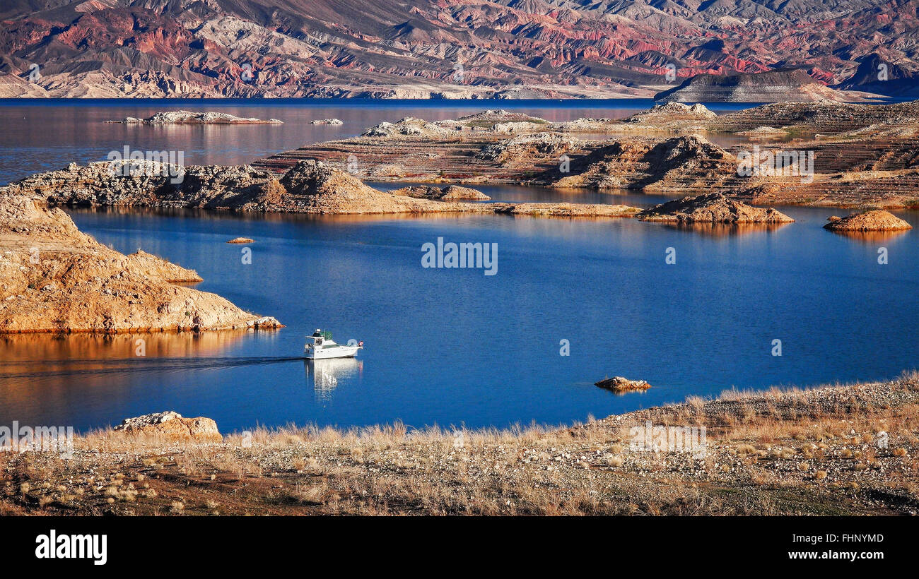 A boat enters a narrow channel on Lake Mead Stock Photo