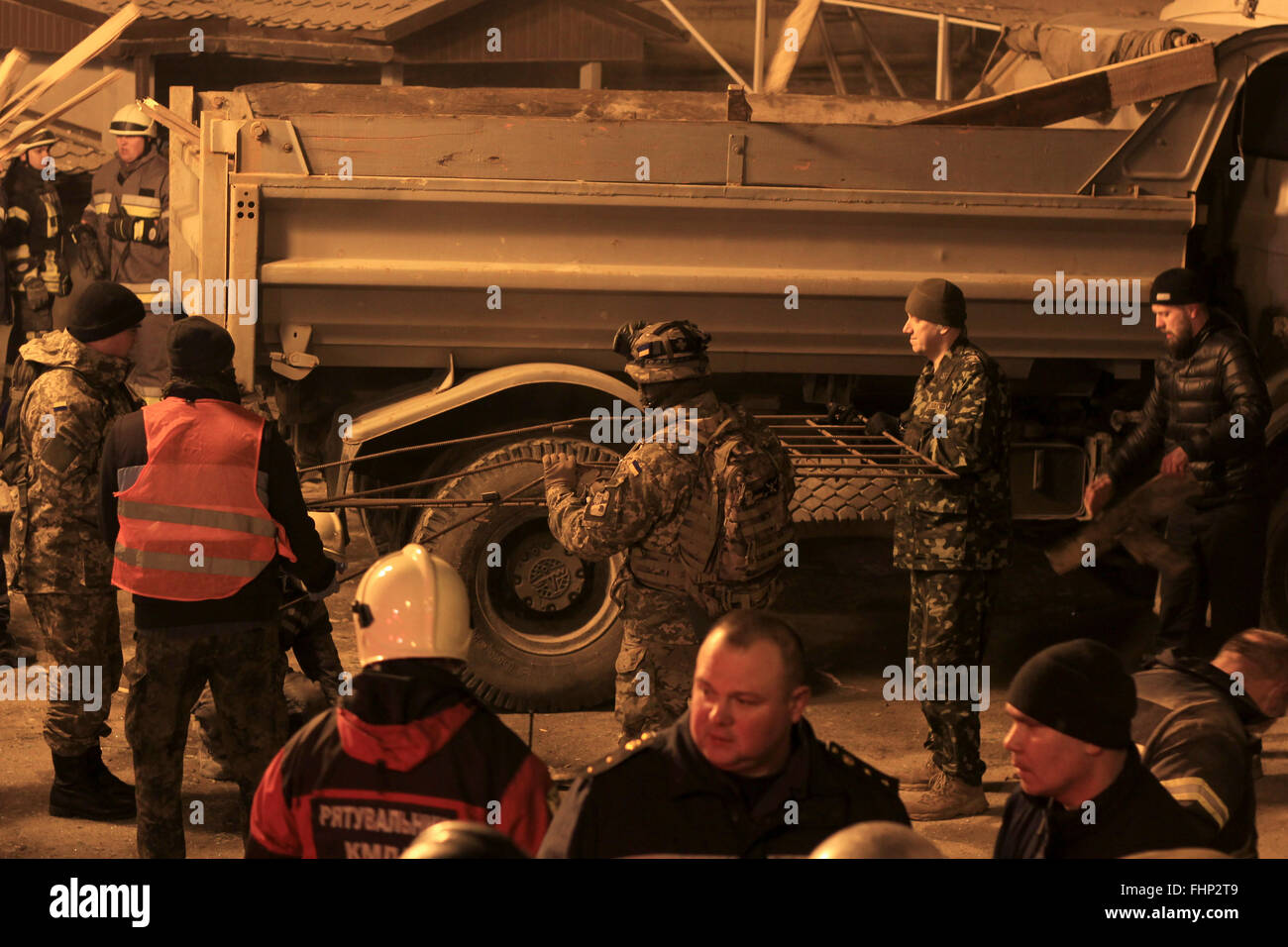 Kiev, Ukraine. 25th Feb, 2016. Ukrainian rescuers attend a rescue ...