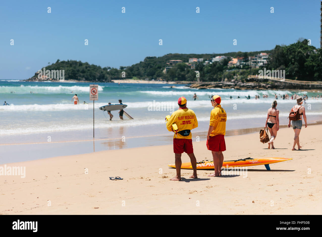 Lifeguards keep watch on Manly Beach on a busy summer day. Stock Photo