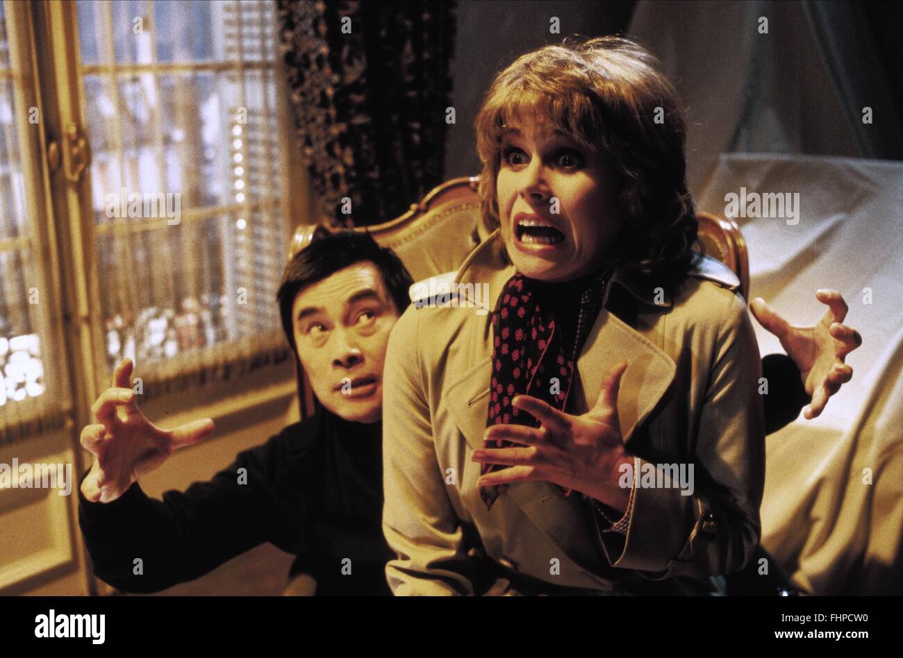 BURT KWOUK & JOANNA LUMLEY CURSE OF THE PINK PANTHER (1983 Stock Photo