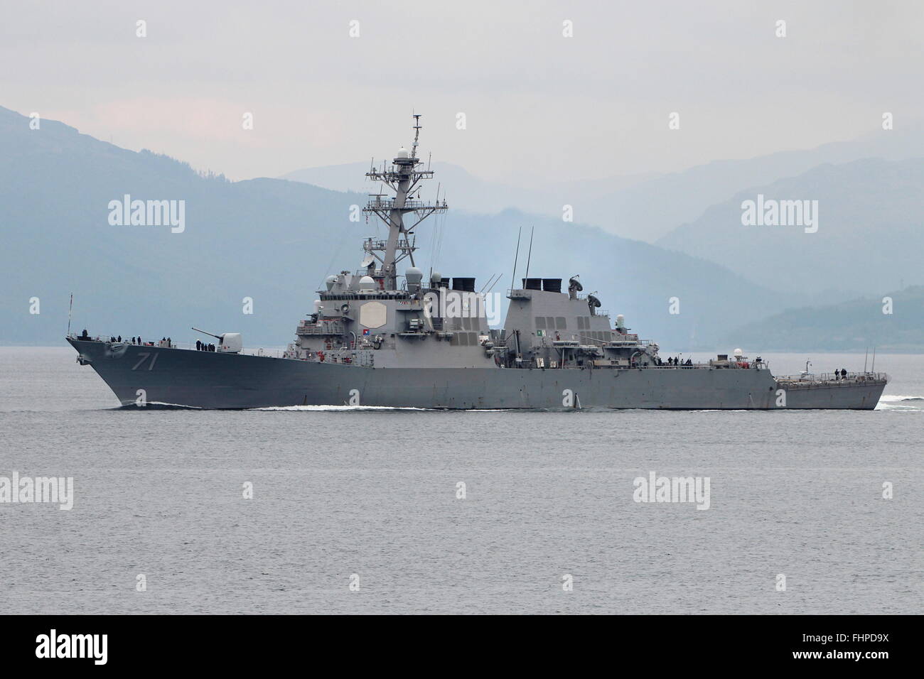 USS Ross (DDG-71), an Arleigh Burke-class destroyer of the United States Navy, heads out for Exercise Joint Warrior 15-2. Stock Photo