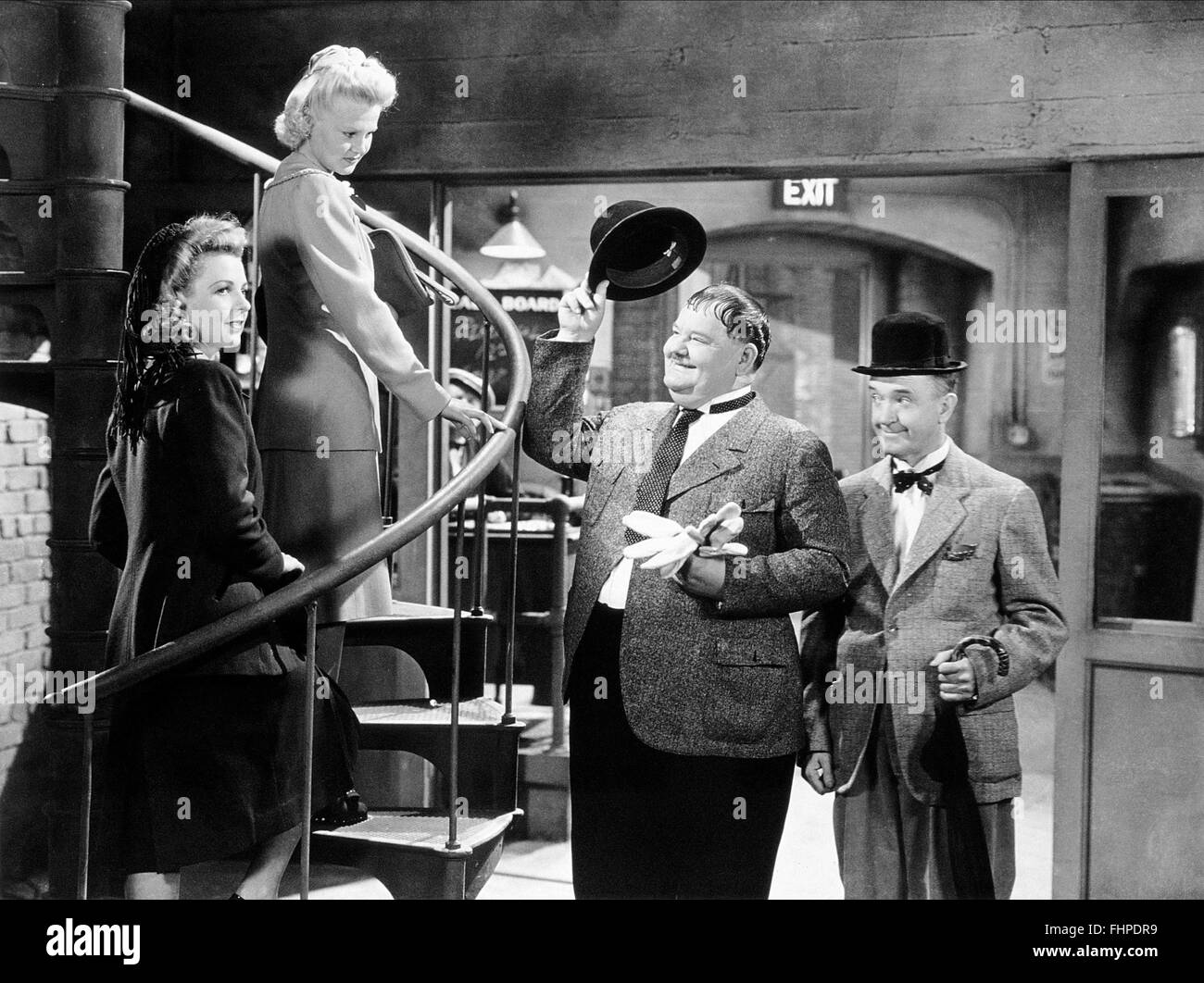 OLIVER HARDY, STAN LAUREL, A-HAUNTING WE WILL GO, 1942 Stock Photo