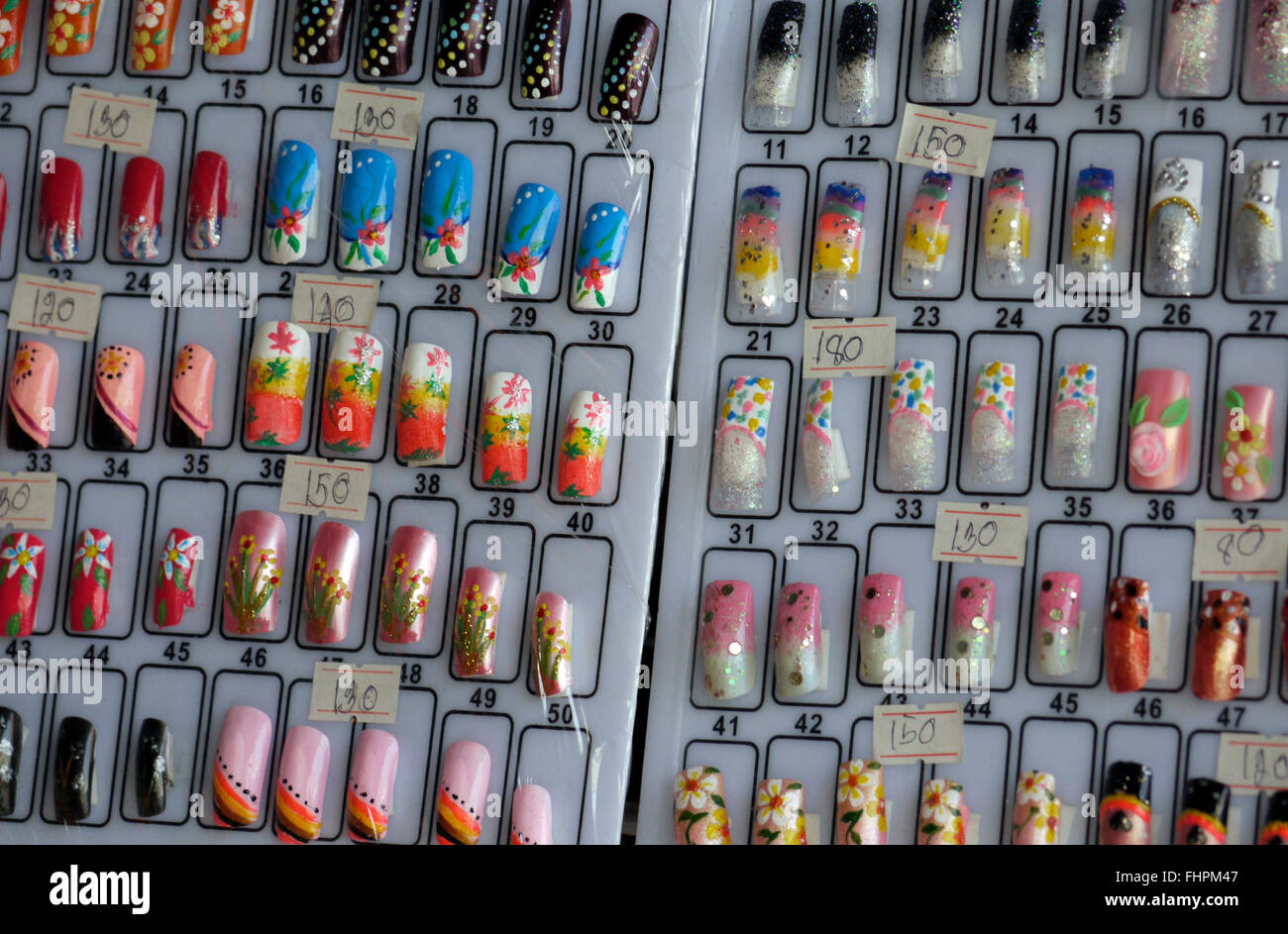 Artificial acrylic nails on display in Pattaya Thailand Stock Photo Alamy