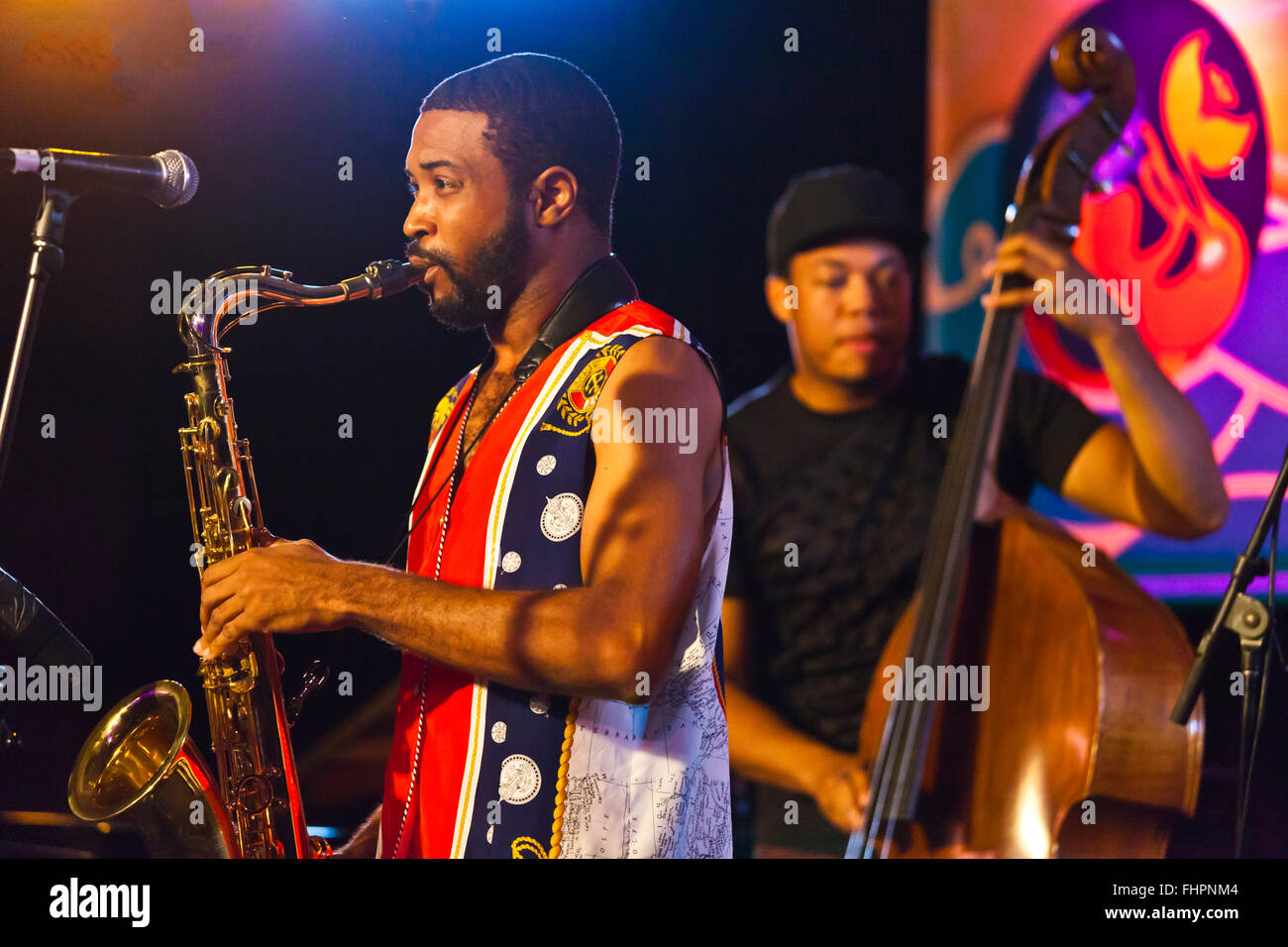 Anthony Ware on sax and Eric Wheeler on base with Theo Crocker and DVRK Funk performing at the 58th Monterey Jazz Festival - Cal Stock Photo