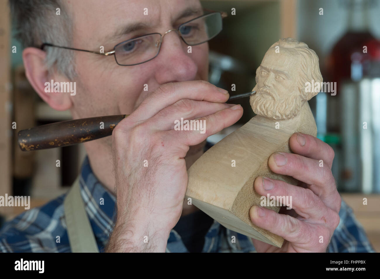Wittenberg, Germany. 19th Jan, 2016. Musical instruments builder Joerg Dahms at work in his workshop for historical instruments in Wittenberg, Germany, 19 January 2016. The sound of historical instruments is nearly vanished. Hardly anybody still builds them, only few can play them. Joer Dahms can do both. He loves old plucking and string instruments and works with them every day. Photo: Peter Endig/dpa/Alamy Live News Stock Photo