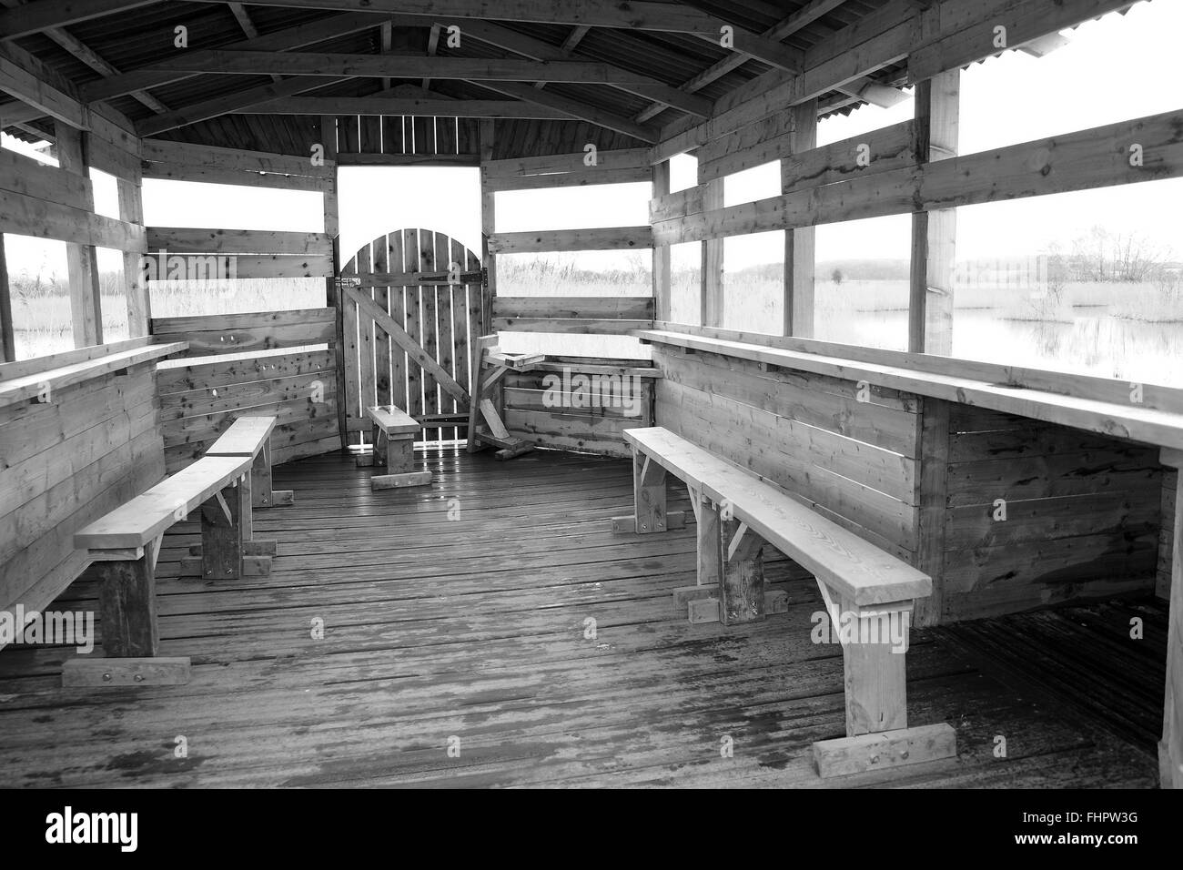 An open bird watching hide at Ham Wall on the Somerset Levels near