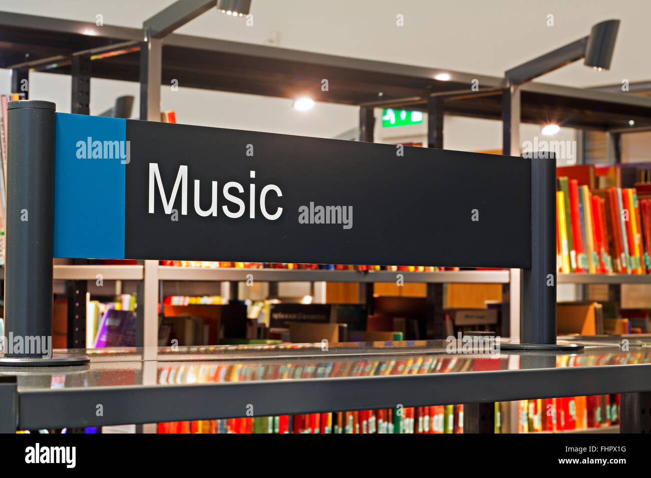 Music section sign inside a modern public library Stock Photo Alamy
