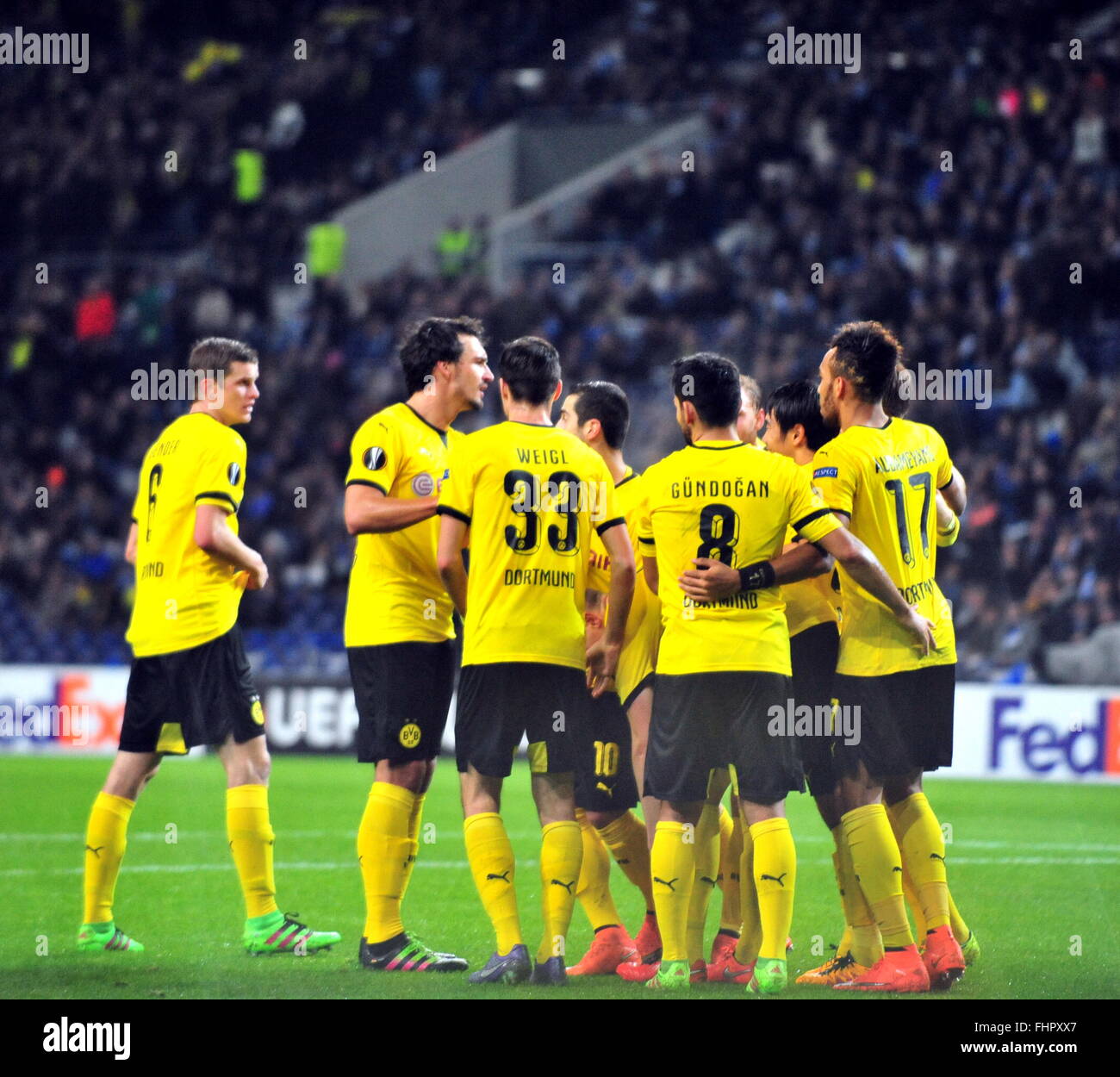 Porto, Portugal. 25th Feb, 2016. Dortmund's players celebrate after scoring  during the second leg of round 16 of the Europa League soccer match between  FC Porto and Borussia Dortmund in Porto, Portugal,
