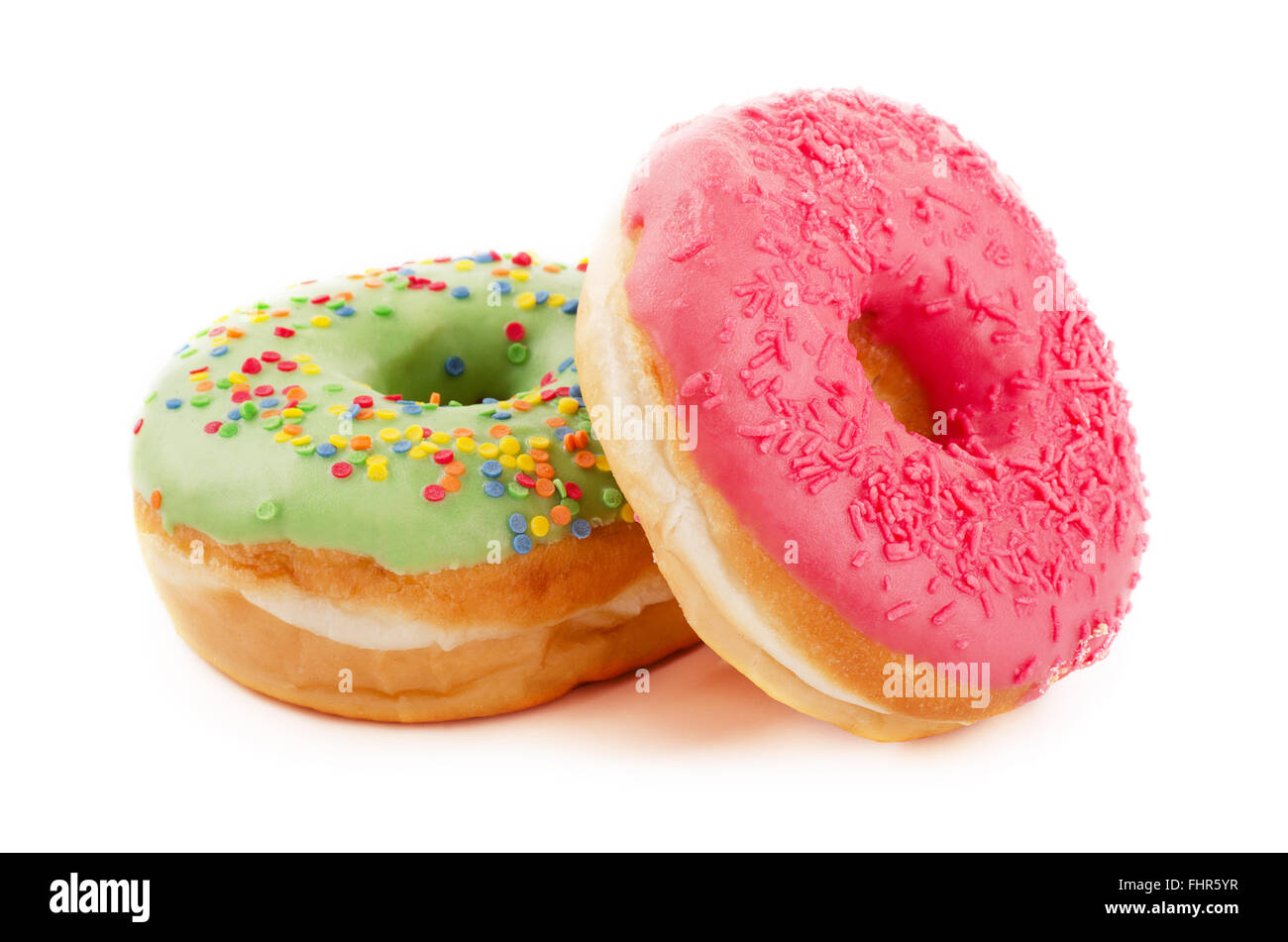 Donuts with sprinkles isolated on white background Stock Photo - Alamy