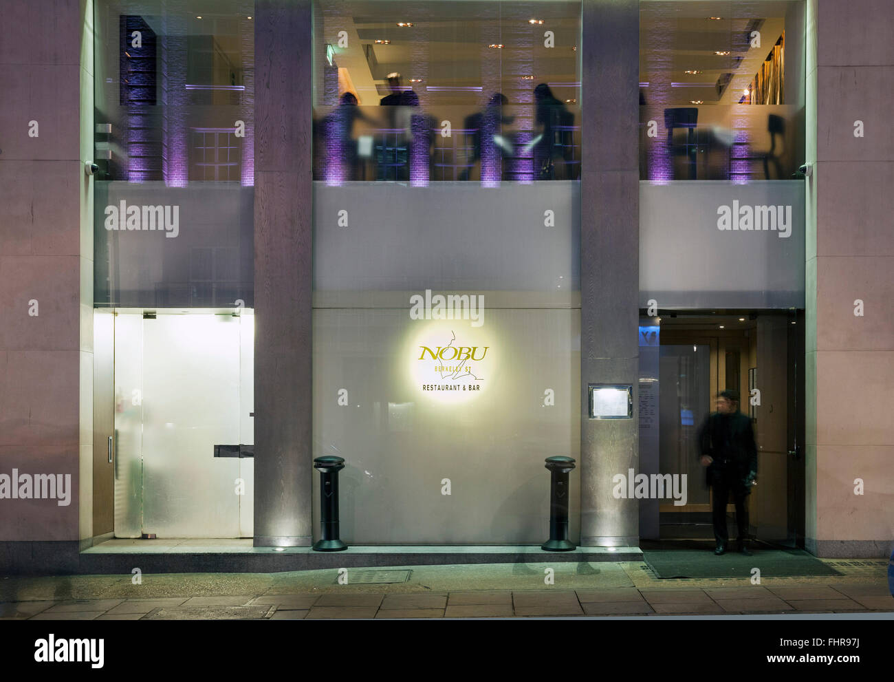 Nobu Berkley Street Restaurant at night with diners and staff insideMayfair Street SignsLondonUnited KingdomArchitect: N Stock Photo