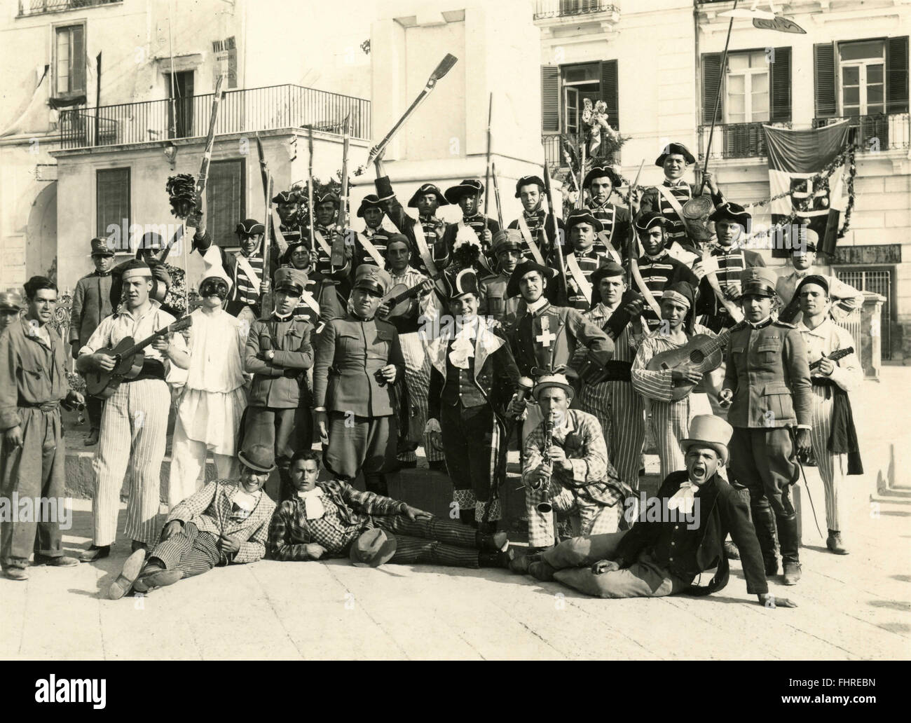Group of men in costume, uniform, Naples, Italy Stock Photo