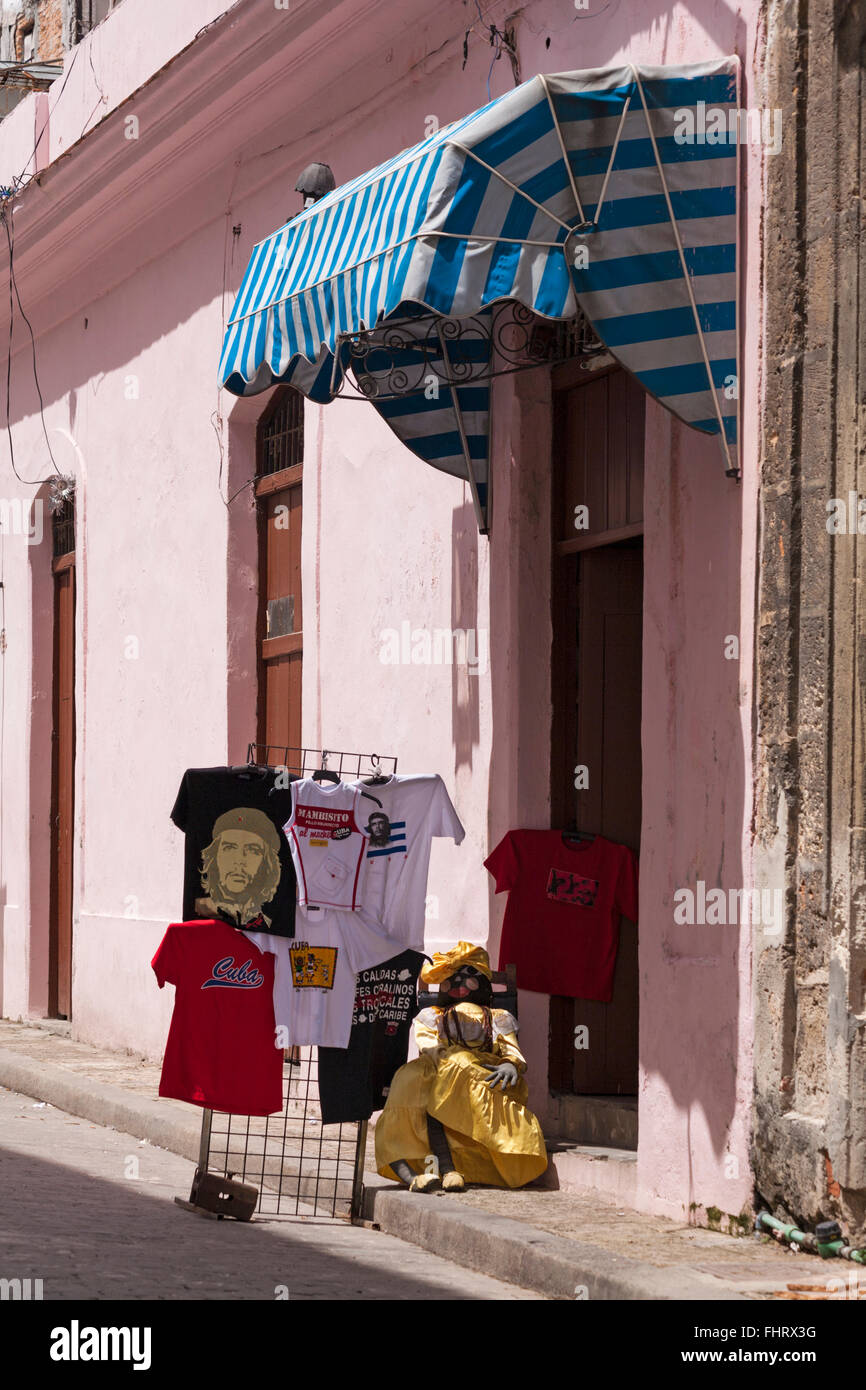 T-shirts and Cuban doll on display in street at Havana, Cuba, West Indies, Caribbean, Central America Stock Photo