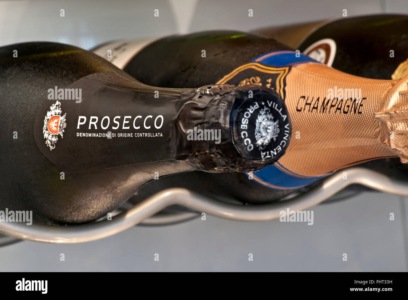 Prosecco and Champagne sparkling wine bottles stored horizontally in