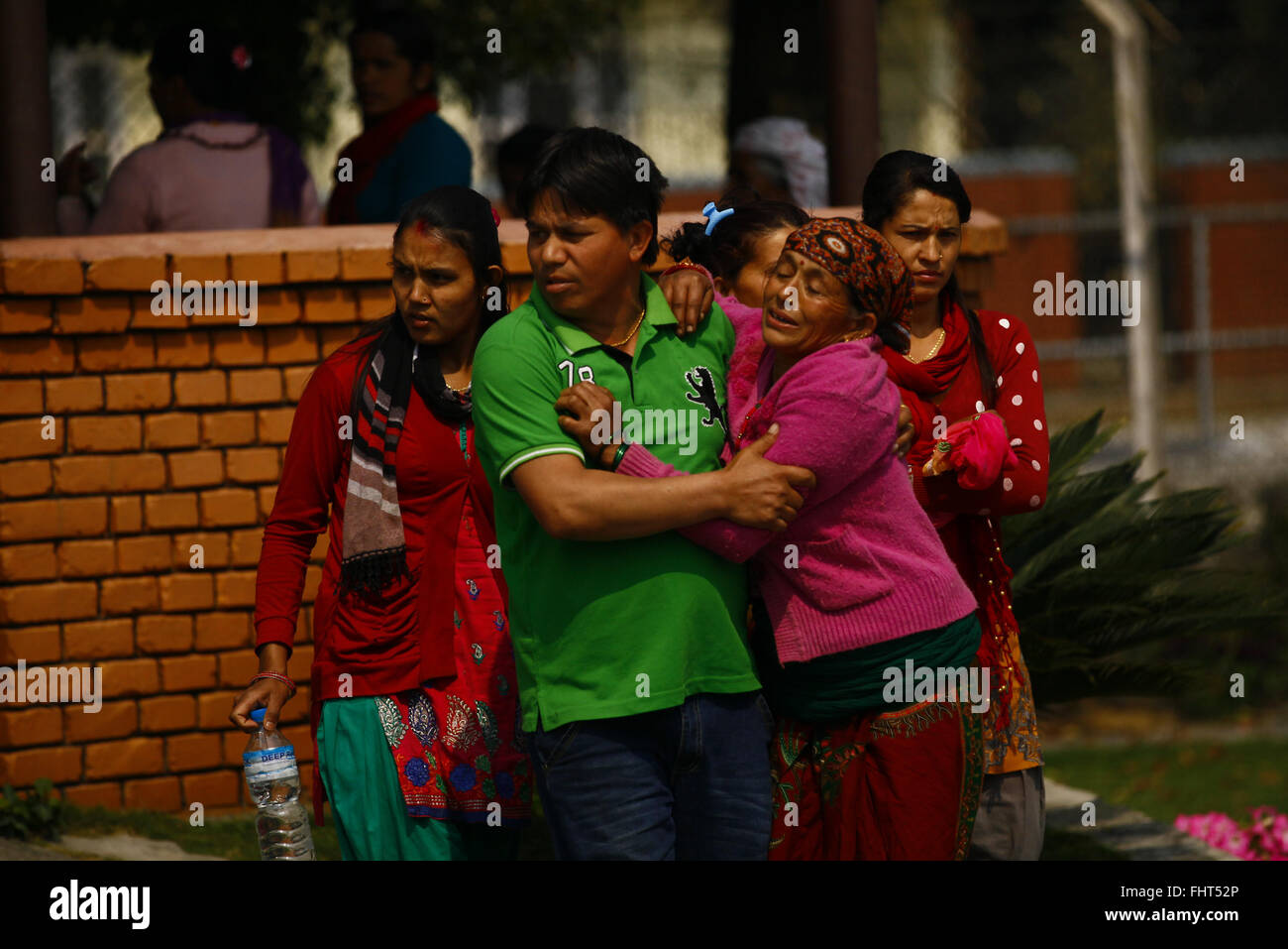 Pokhara. 26th Feb, 2016. Relatives of victims of an aircraft crash cry at Pokhara hospital in Nepal, Feb. 26, 2016. Authorities in Nepal's western Kaski district said they have started handing over the identified bodies of Tara Air crash victims to their families after the postmortem. The Twin Otter plane of Tara Air crashed in Dana of Myagdi district on Wednesday, killing all 23 people aboard. Credit:  Pratap Thapa/Xinhua/Alamy Live News Stock Photo