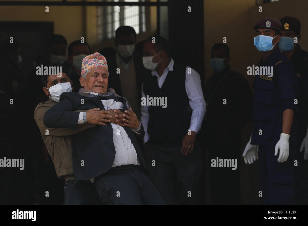 Pokhara. 26th Feb, 2016. A relative of a victim of an aircraft crash cries at Pokhara hospital in Nepal, Feb. 26, 2016. Authorities in Nepal's western Kaski district said they have started handing over the identified bodies of Tara Air crash victims to their families after the postmortem. The Twin Otter plane of Tara Air crashed in Dana of Myagdi district on Wednesday, killing all 23 people aboard. Credit:  Pratap Thapa/Xinhua/Alamy Live News Stock Photo