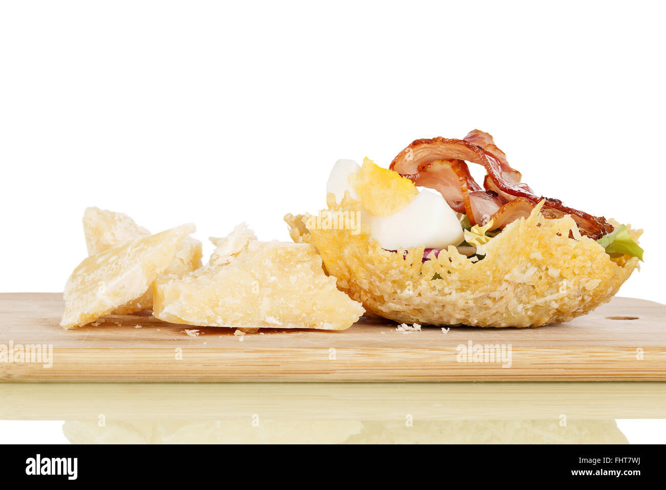 Parmesan basket filled with salad Stock Photo Alamy