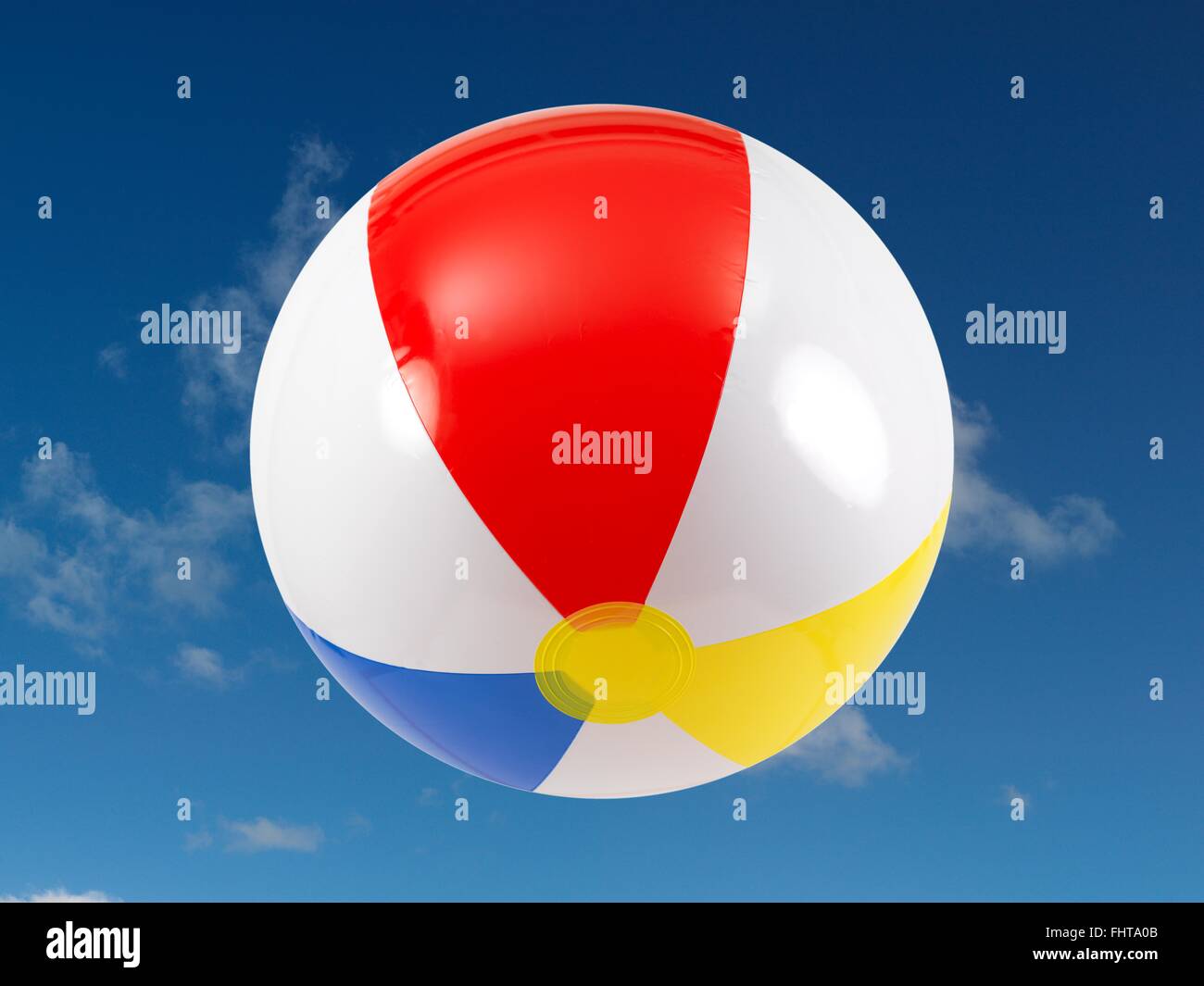 A beach ball in the sky Stock Photo - Alamy